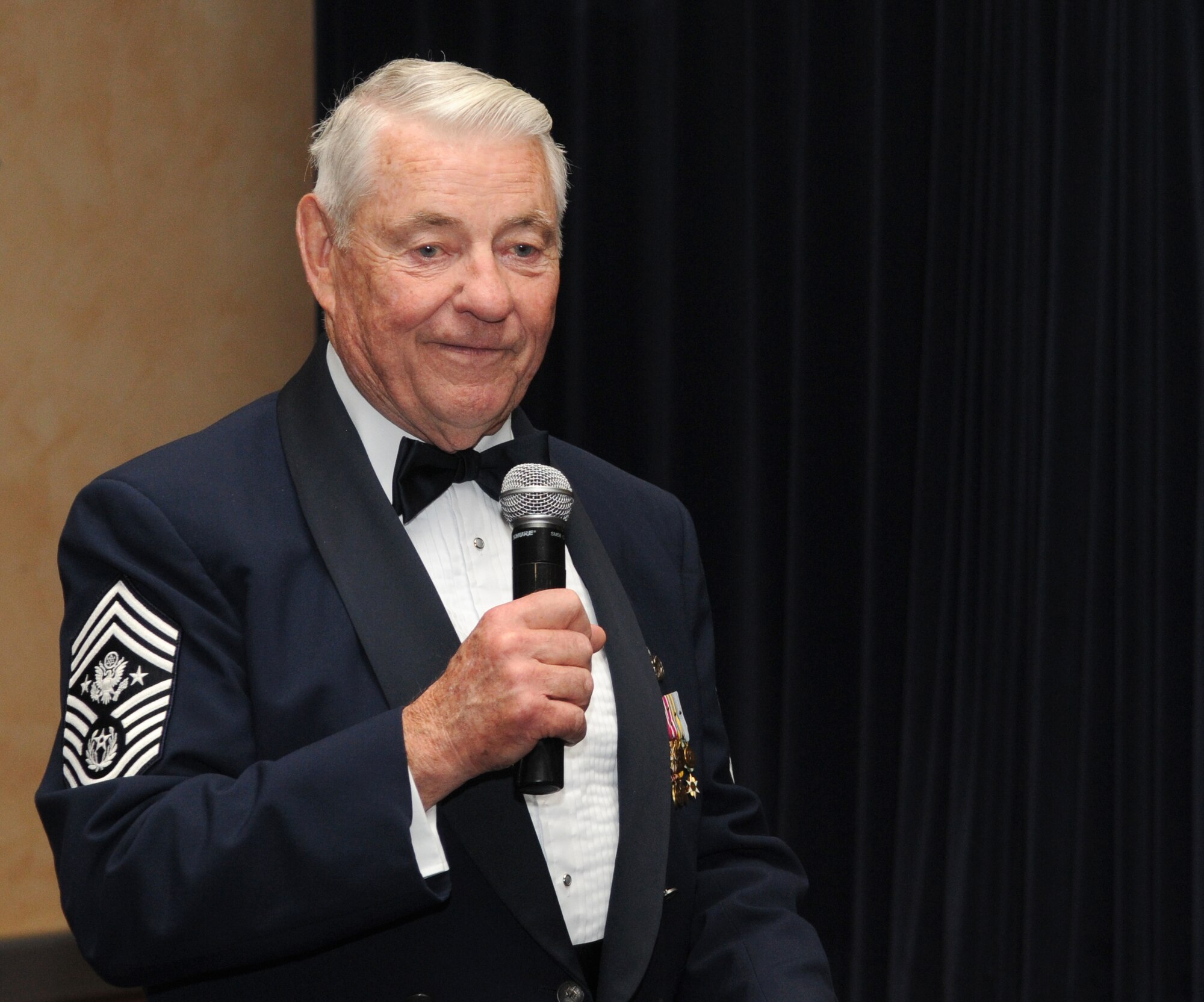 SPANGDAHLEM AIR BASE, Germany – Robert D. Gaylor, fifth Chief Master Sgt. of the Air Force, speaks during the 2010 Air Force Ball Sept. 10. Chief Gaylor’s speech addressed what he considers the four biggest differences between today’s Air Force and the Air Force of his day: training, technology, tribe (family) and trust. (U.S. Air Force photo/Staff Sgt. Benjamin Wilson)