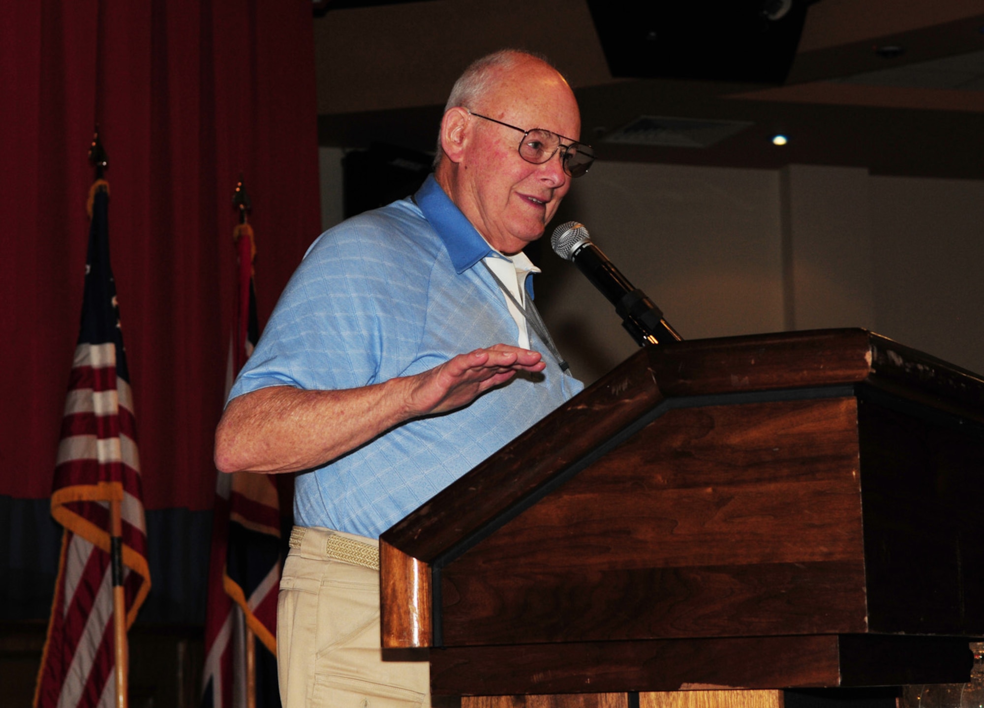 RAF MILDENHALL, England -- Retired Capt. Robert Wolff, former prisoner of war held captive at Stalag Luft III, near Sagen in East Germany (now Poland), speaks to a full house at the RAF Mildenhall POW/MIA Fallen Comrade Remembrance Week Breakfast Sept. 13 at the Galaxy Club. Captain (retired) Wolff was the guest speaker and shared stories of his time as a pilot in the Army Air Corps. He was assigned to the 100th Bomb Group, 418th Squadron, at Thorpe Abbots, Norfolk, from where he received his first combat experience. The former captain was a POW from October 1943 to April 1945. (U.S. Air Force photo/Karen Abeyasekere)