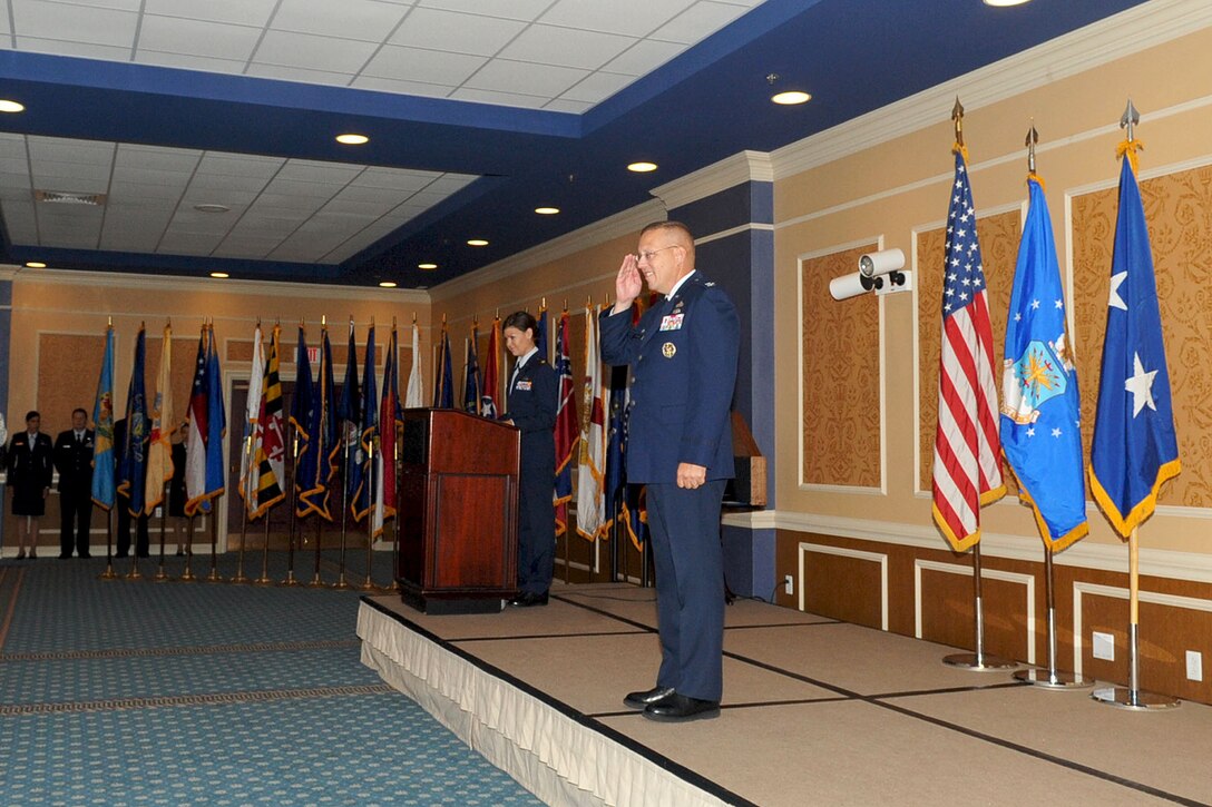 Col. Daniel R. Johnson renders a final salute to the men and women of the 480th Intelligence, Surveillance and Reconnaissance Wing during a change of command ceremony here Sept. 9. Immediately following the ceremony, Col. Johnson retired from the Air Force after over 30 years of service to his country. (U.S. Air Force photo/Staff Sgt. Ashley Hawkins)