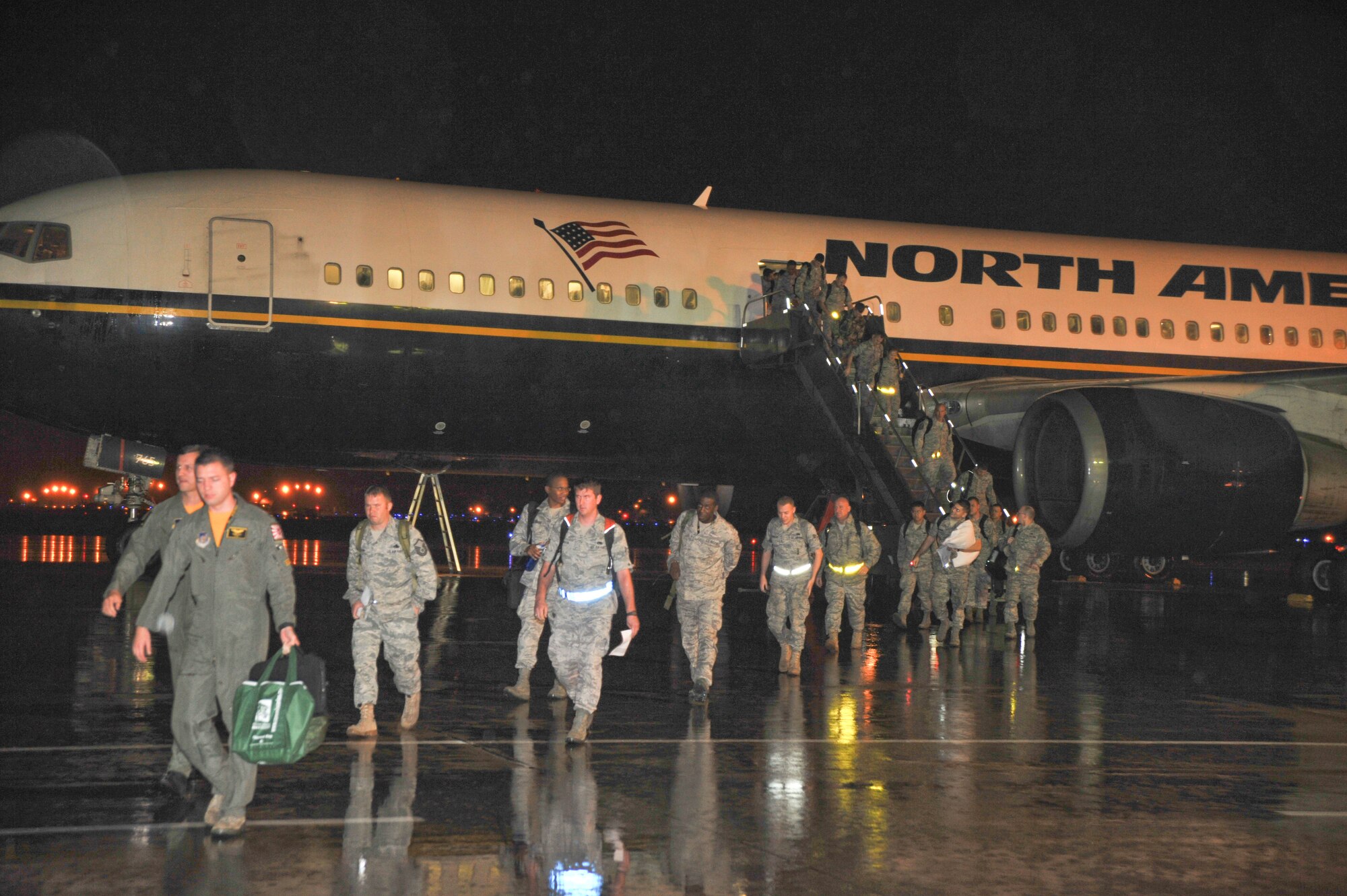 Members of Misawa Air Base return to Misawa Air Base, Japan after a six-month deployment to Kunsan Air Base, Korea, Sept. 13, 2010. (U.S. Air Force photo/Tech. Sgt. Russell McBride/Released)