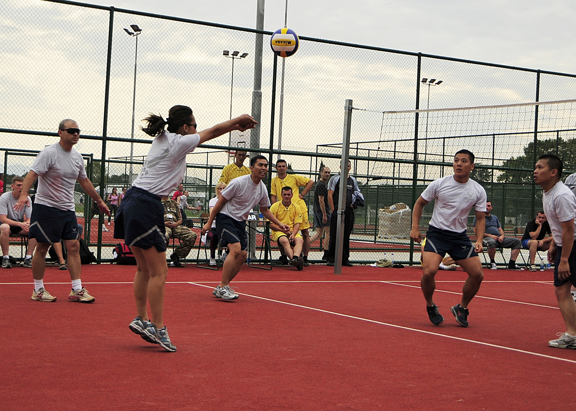 U.S. Air Force Staff Sgt. Kimberly Holder, a medical technician from the 48th Medical Operations Sqadron at RAF Lakenheath, England, spikes the ball during a volleyball game against armed forces members of Serbia, Macedonia and Ukraine during the MEDCEUR10 sports day at Danilovgrad Army Base, Montenegro, Sept. 12. Being fit to fight is an important factor in any military service and this factor will help the service members during MEDCEUR10, a medical training exercise in central and eastern Europe. For more information, go to www.usafe.af.mil/medceur.asp and www.odbrana.gov.me. (U.S. Air Force photo/Airman 1st Class Tiffany Deuel)