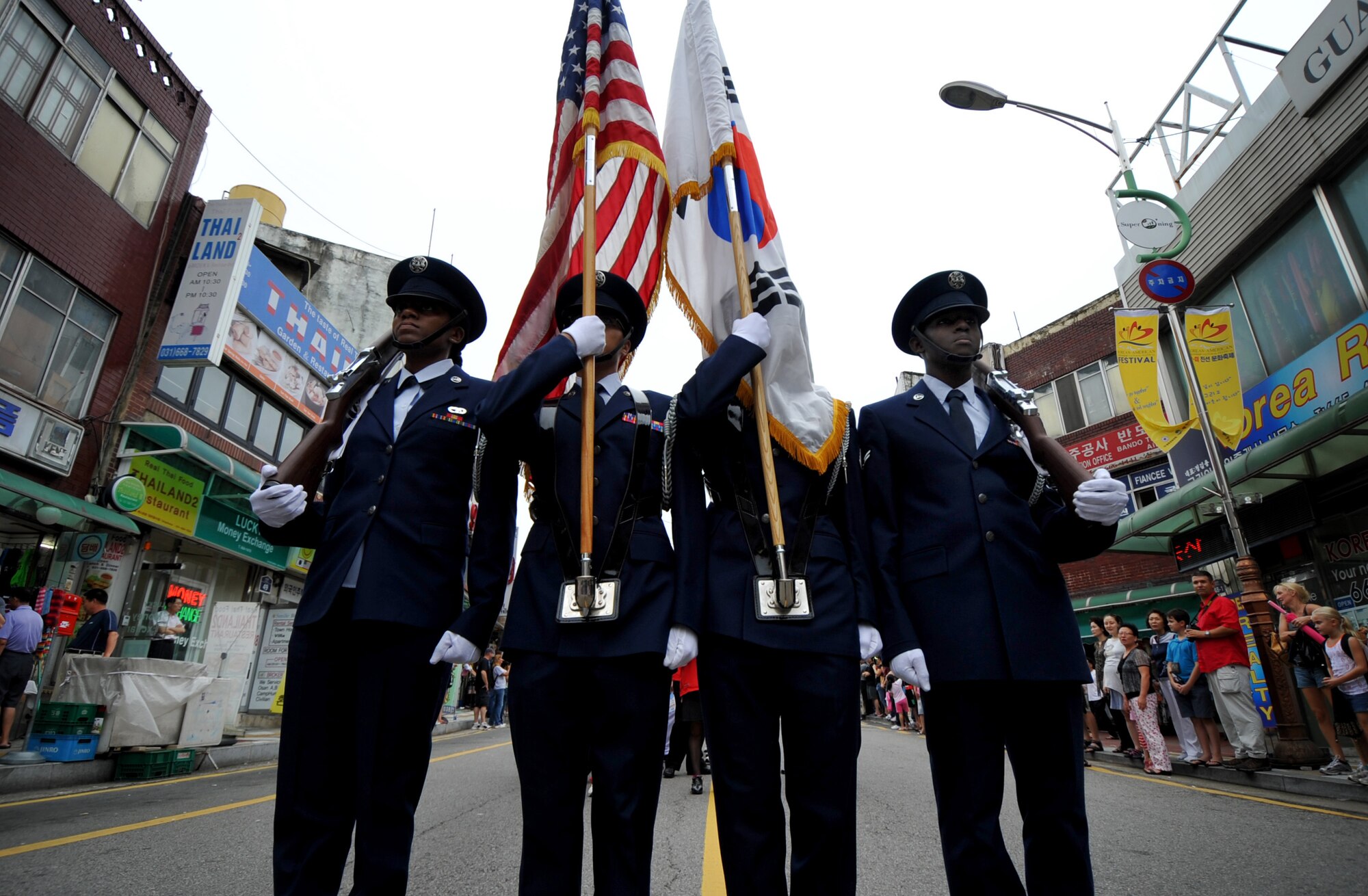 The Republic of Korea Osan Air Base Honor Guard marches in the parade during the 2010 Korean American Cultural Friendship Festival, Sept. 11. The festival was a celebration of the long-standing relationship between Osan Air Base and the surrounding city of Songtan. (U.S. Air Force Photo/Senior Airman Evelyn Chavez)