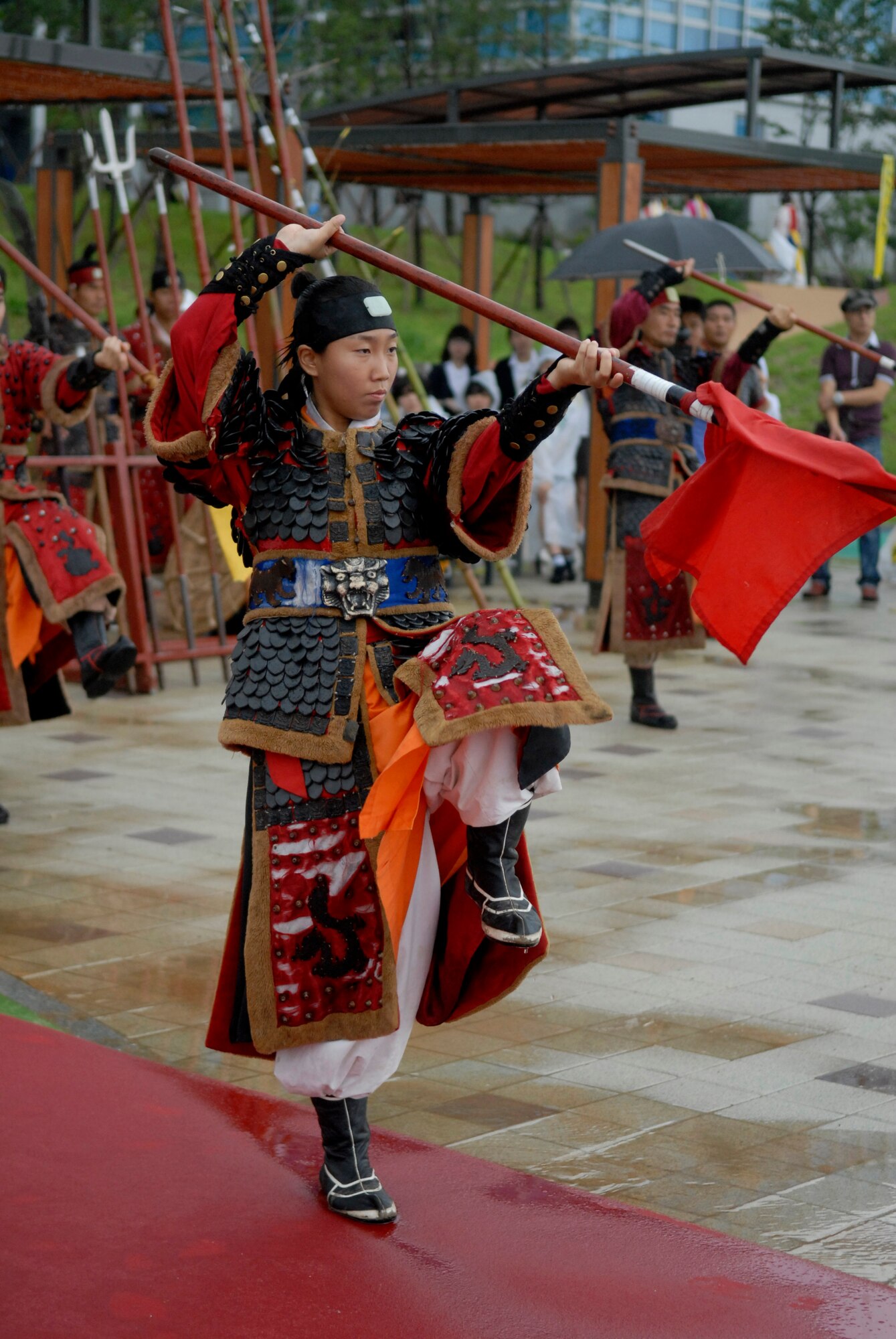 Korean performers maneuver flags and swords during a routine at the 2010 Korean American Cultural Friendship Festival, Sept. 11.  The festival was a celebration of the long-standing relationship between Osan Air Base and the surrounding city of Songtan. (U.S. Air Force Photo/Senior Airman Evelyn Chavez)