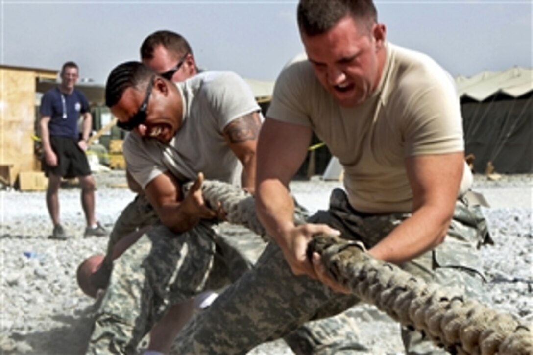 U.S. soldiers participate in a tug-of-war competition on Forward Operating Base Shank in Logar province, Afghanistan, Sept. 10, 2010. The soldiers are assigned to the 503rd Infantry Regiment, 173rd Airborne Brigade Combat Team.