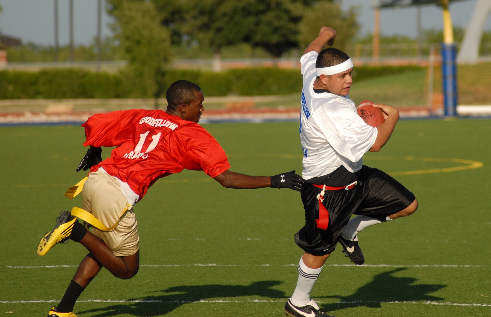 Stephen Rivera, 1st Responders, tries to juke 17th Medical Group player 
during an intramural football game Sept. 13. (U.S. Air Force photo/Connie Hempel)