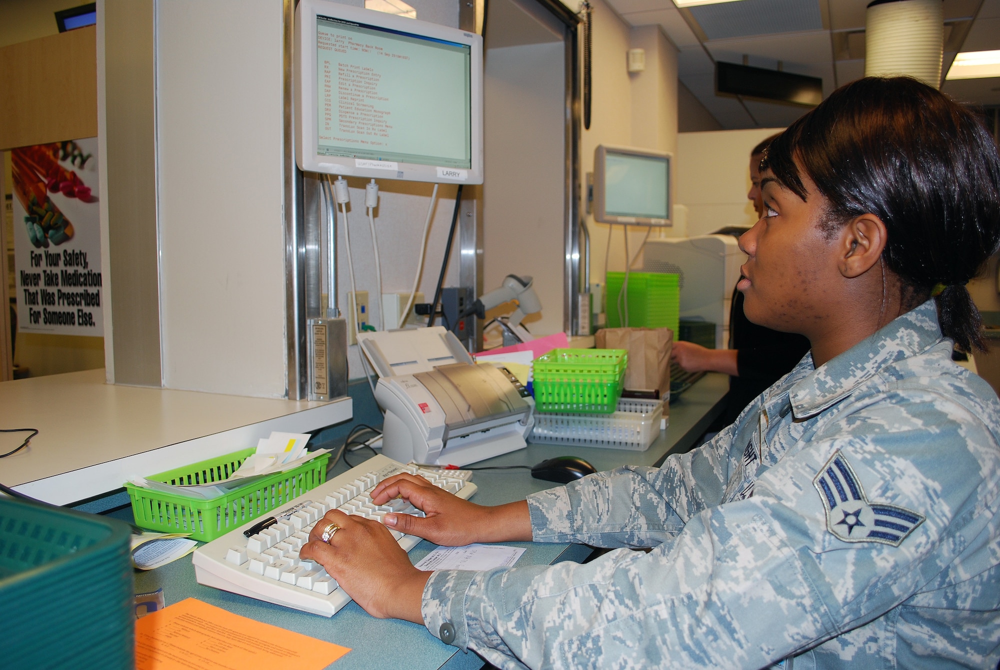 Senior Airman D’Shaunte McKnight, 82nd Medical Support Squadron pharmacy technician, reviews a prescription at the pharmacy on Sheppard Air Force Base, Texas, Sept. 14 to ensure safe use and good customer service.  The technicians check their database to see if the customer has used the medicine before, whether their prescription has run out or not, and other information needed to safely issue medication to patients.  (U.S. Air Force photo/Tech. Sgt. Vernon Cunningham) 