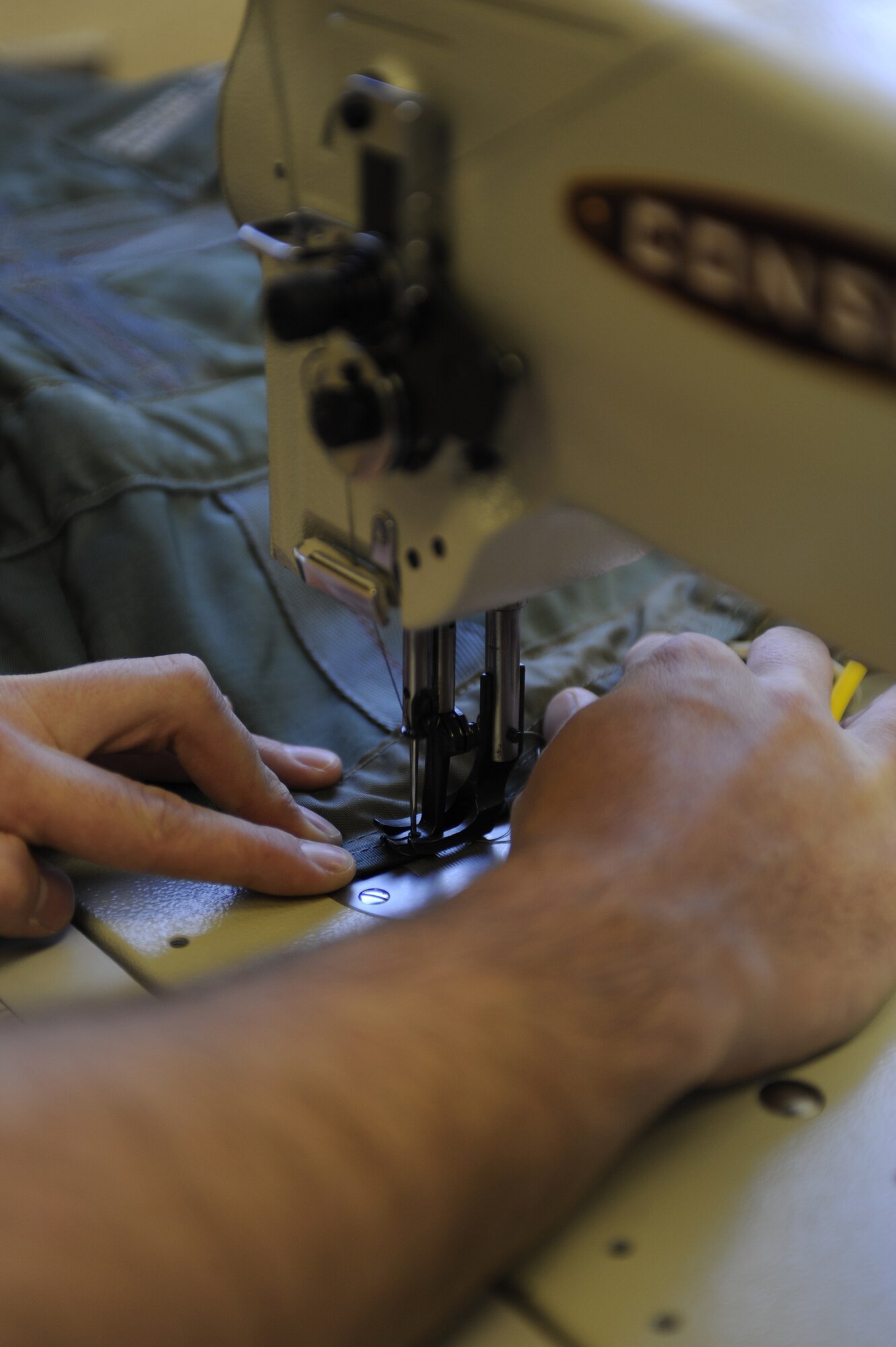 Airman 1st Class Jerred Brown repairs seams Sept. 13, 2010, Eielson Air Force Base, Alaska. It is nessesary to keep all survival equipment in top condition because someones life may depend on it. Airman Brown is an Aircrew Flight Equipment Apprentice assigned to the 354th Aircrew Flight Equipment. (U.S. Air Force photo/Senior Airman Willard E. Grande II)