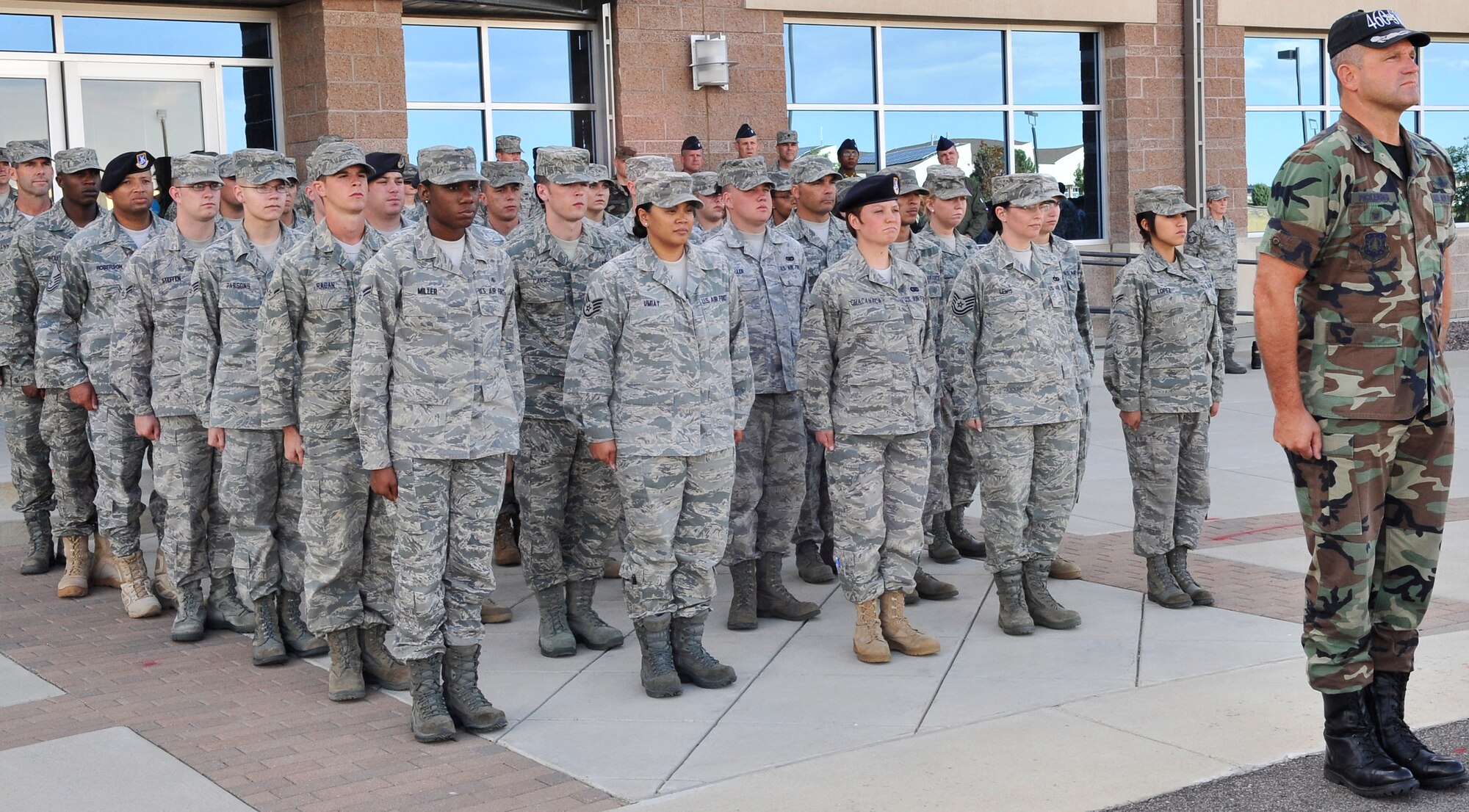 BUCKLEY AIR FORCE BASE, Colo. -- Col. Trent Pickering, 460th Space Wing vice commander, commands a formation during the Patriot Day ceremony. A moment of silence was held for the tragic event that occurred on September 11, 2001. (U.S. Air Force photo by Airman 1st Class Paul Labbe)