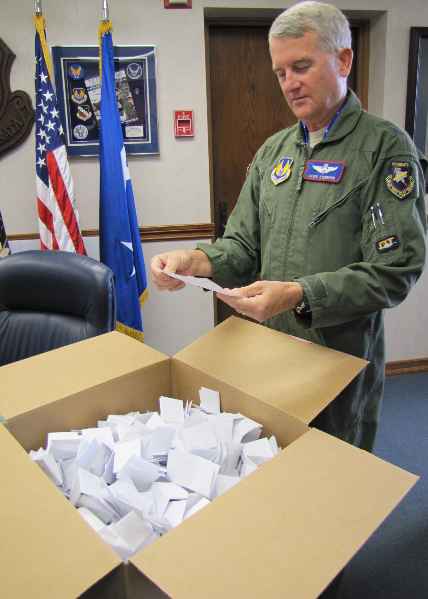 During the Sept. 10 lakebed fly-in lottery, Maj. Gen. David J. Eichhorn, Air Force Flight Test Center commander, randomly selects the names of 100 pilots to land on the Rosamond Dry Lakebed Oct. 1 for the 2010 Flight Test Nation Lakebed Fly-in. (U.S. Air Force photo by Staff Sgt. Angelique N. Smythe)