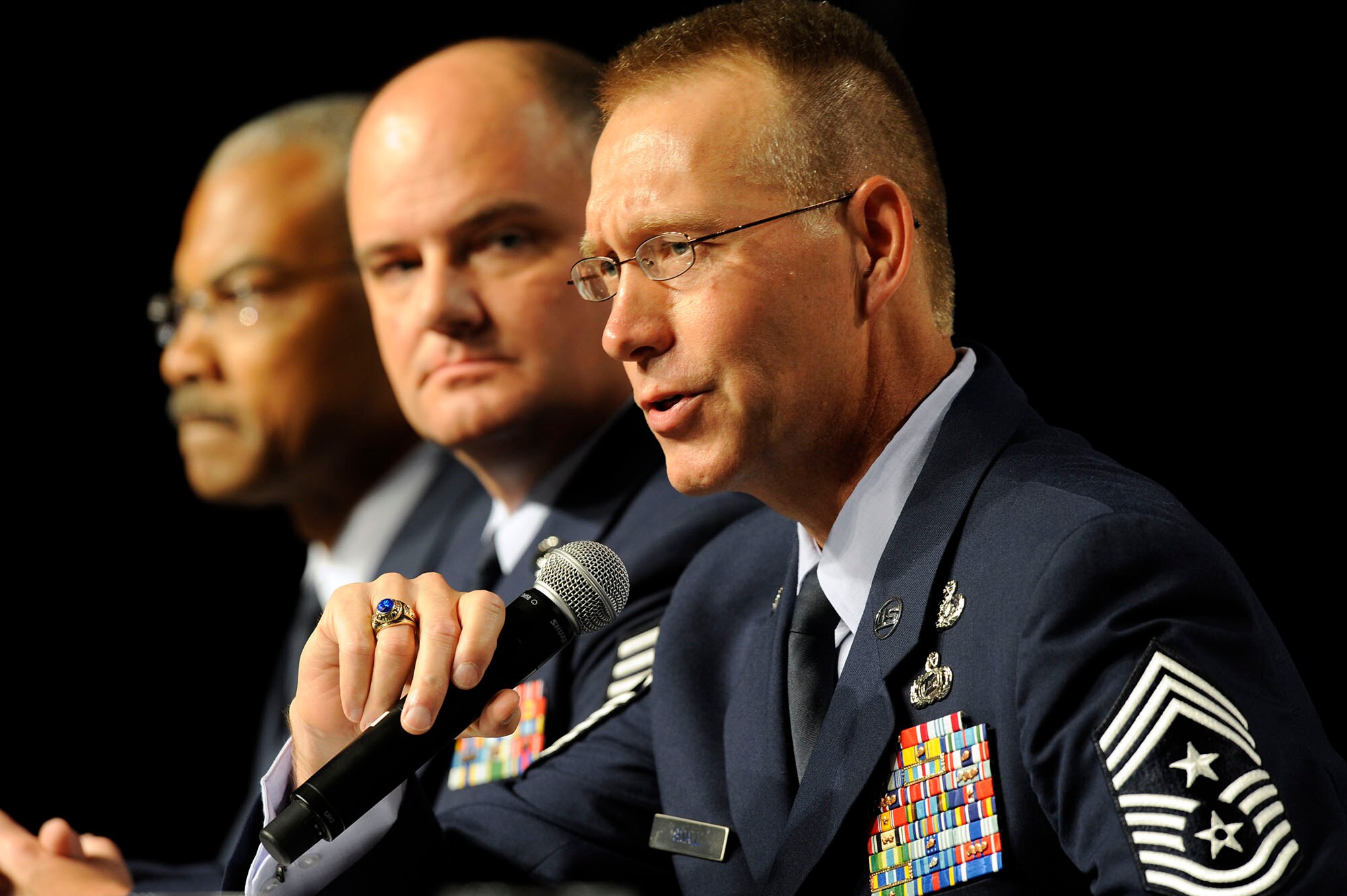 Chief Master Sgt. Todd Small (right), command chief for Air Force Space Command, answers a question Sept. 13, 2010, during a command chiefs' forum at the Air Force Association's Air and Space Conference and Technology Exposition at National Harbor in Oxon Hill, Md. The panel was led by Chief Master Sgt. of the Air Force James Roy.  (U.S. Air Force photo/Scott M. Ash)