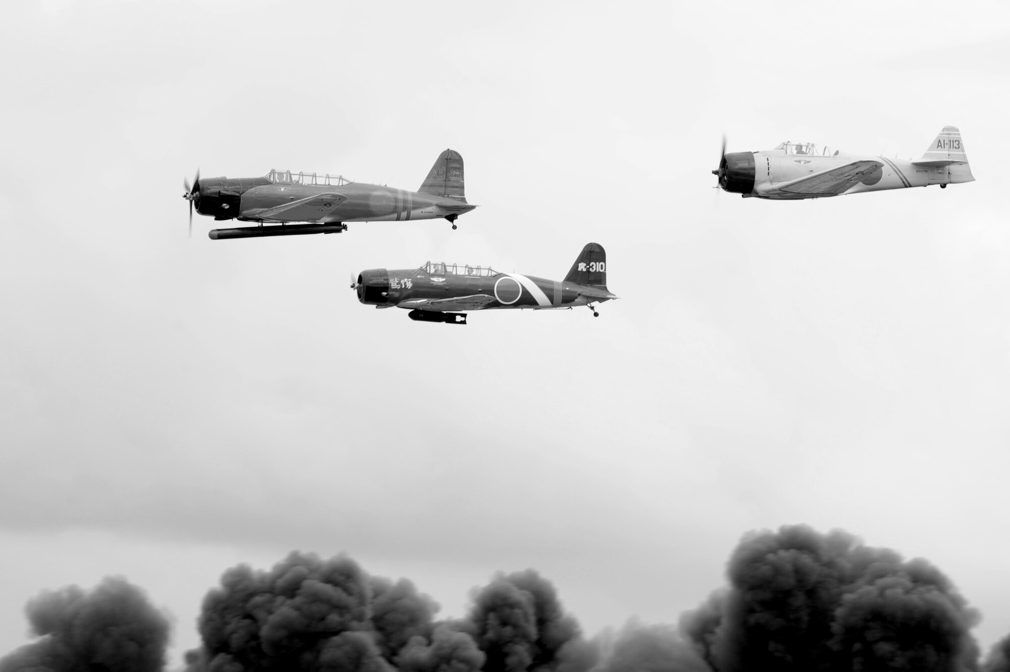 Tora! Tora! Tora!, a reenactment of the Dec. 7, 1941 attack on Pearl Harbor with pyrotechnic explosions  performs during the 2010 Airpower Over the Midwest Air Show held Sept. 11 at Scott AFB. Other headlining acts included the Army Golden Knights Parachute Team and the Navy Blue Angels. (U.S. Air Force photo by Staff Sgt. Brian J. Valencia)