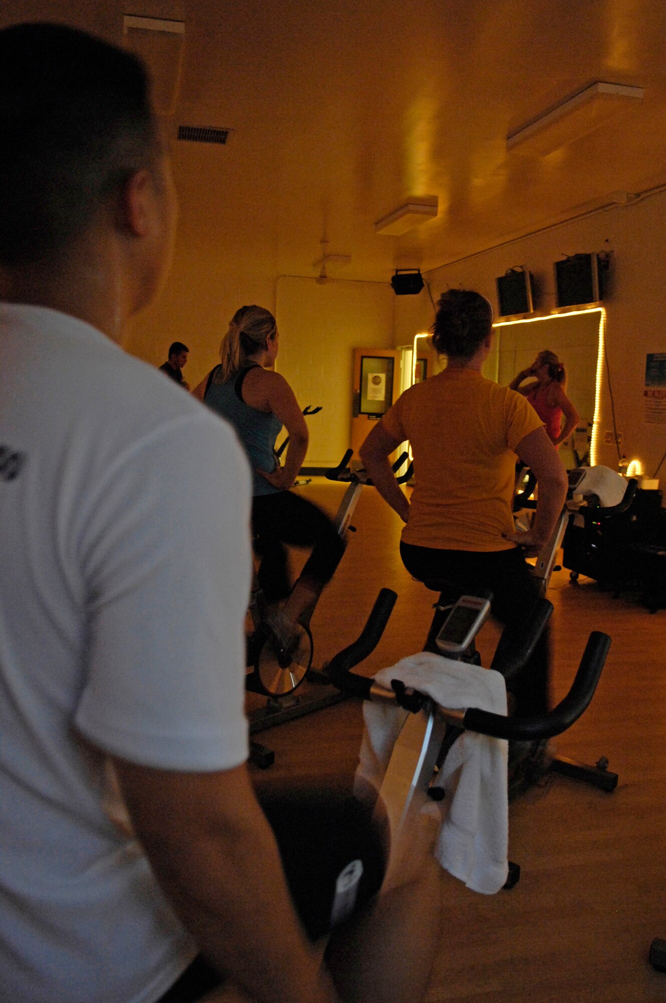 VANDENBERG AIR FORCE BASE, Calif. – Taking a breather, members of the base pause after a set during an indoor cycling class at the fitness center annex here Tuesday, Sept. 14, 2010. The fitness center annex conducts various classes that are taught by certified fitness professionals who provide safe and effective exercises for all participants. (U.S. Air Force photo/Airman 1st Class Lael Huss)