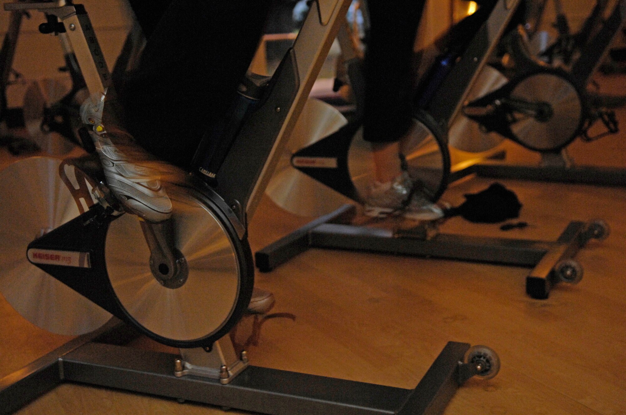 VANDENBERG AIR FORCE BASE, Calif. – Members of the base sprint during the last 10 minutes of an indoor cycling class at the fitness center annex here Tuesday, Sept. 14, 2010.  Specially designed biking shoes clip onto the pedals of a bicycle to more efficiently transfer power and weight to the pedals during a ride. (U.S. Air Force photo/Airman 1st Class Lael Huss)