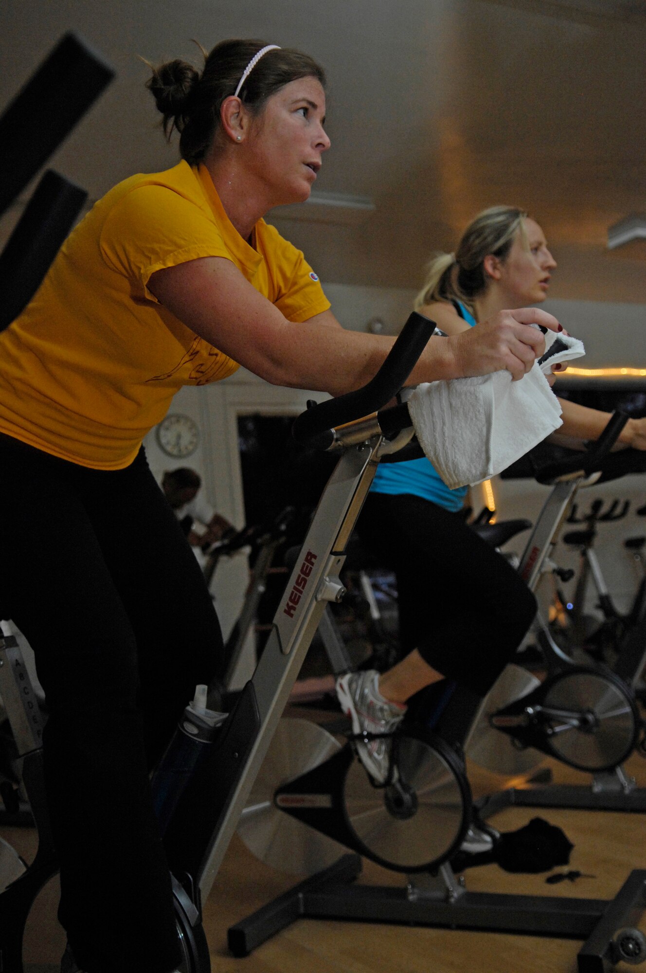 VANDENBERG AIR FORCE BASE, Calif. – Michelle Abbott and Lacey Brown, dependents of active-duty military members, attend an indoor cycling class at the fitness center annex here Tuesday, Sept. 14, 2010. The fitness center annex conducts various classes which are taught by certified fitness professionals who provide safe and effective exercises for all participants. (U.S. Air Force photo/Airman 1st Class Lael Huss)