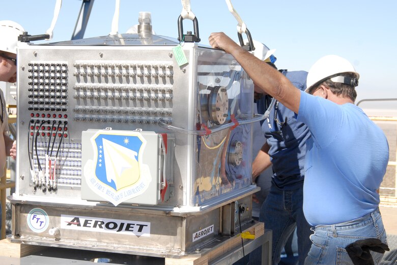 The Upper Stage Engine Technology turbo pump sits in a "test skid" container, which has more than 135 connectors that will be used to collect data once testing is started. Liquid hydrogen will be fed through the pump to see how it performs once attached to the test stand. (U.S. Air Force photo/Kenji Thuloweit)
