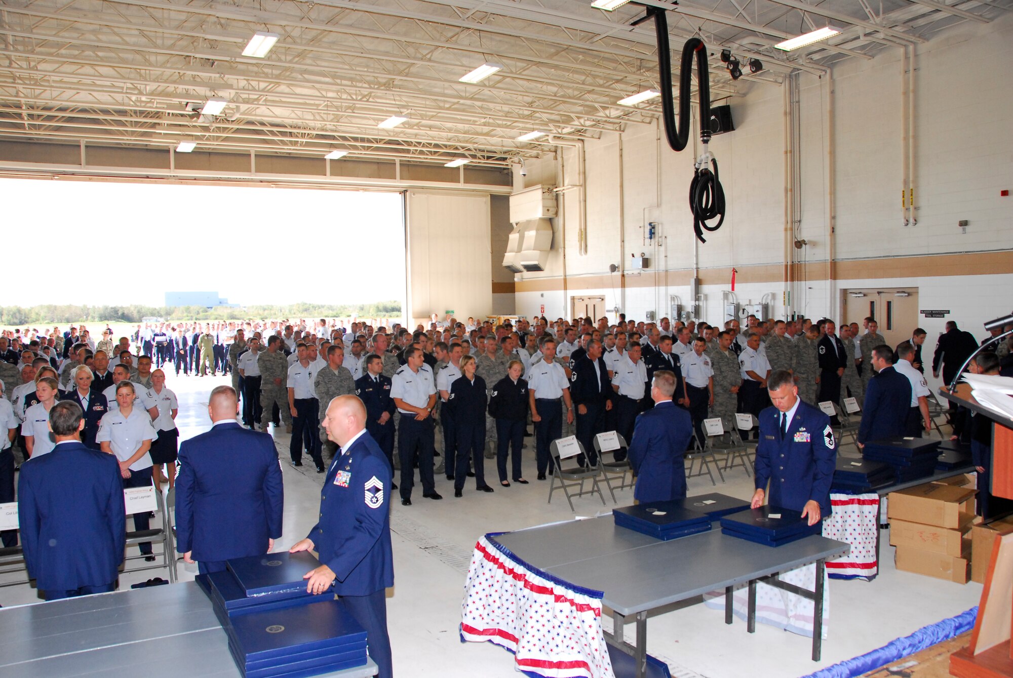 148th Fighter Wing leadership prepares to present Hometown Heroes Awards to fellow Airmen during the first Hometown Heroes ceremony on Sept. 12, 2010 at the 148th Fighter Wing Air National Guard Base in Duluth, Minn.  The Hometown Heroes Award recognizes those Airmen who have deployed for 30 or more consecutive days since Sept. 11, 2001.  (U.S. Air Force Photo by TSgt Amie Dahl)