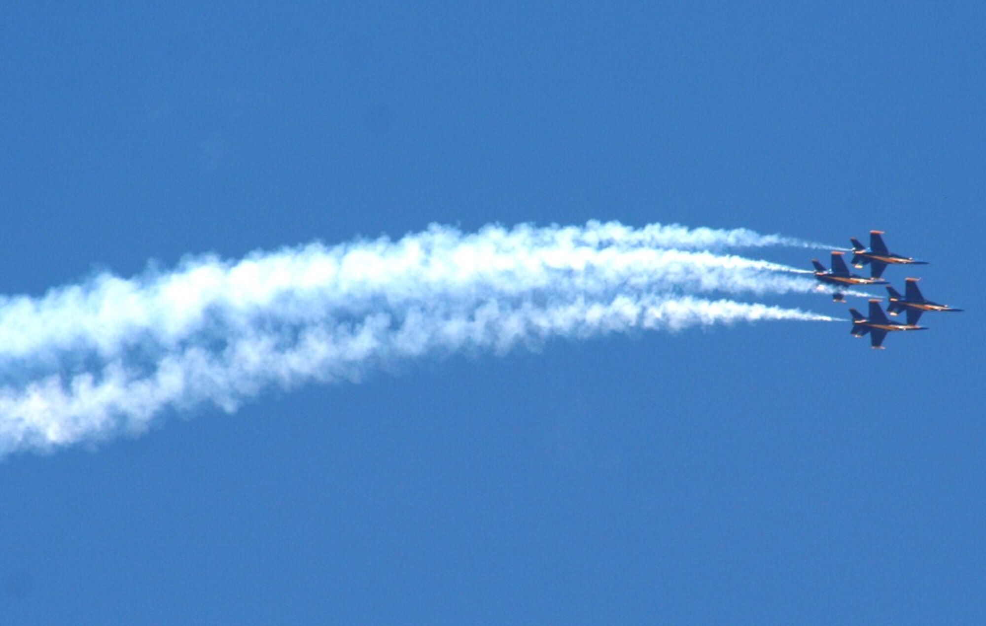 The U.S. Navy's Blue Angels aerial demonstration team performs during the 2010 Airpower Over The Midwest Airshow on Sept. 11, 2010, at Scott Air Force Base, Ill. Tens of thousands of people attended the two-day airshow. (U.S. Air Force Photo/Master Sgt. Scott T. Sturkol)