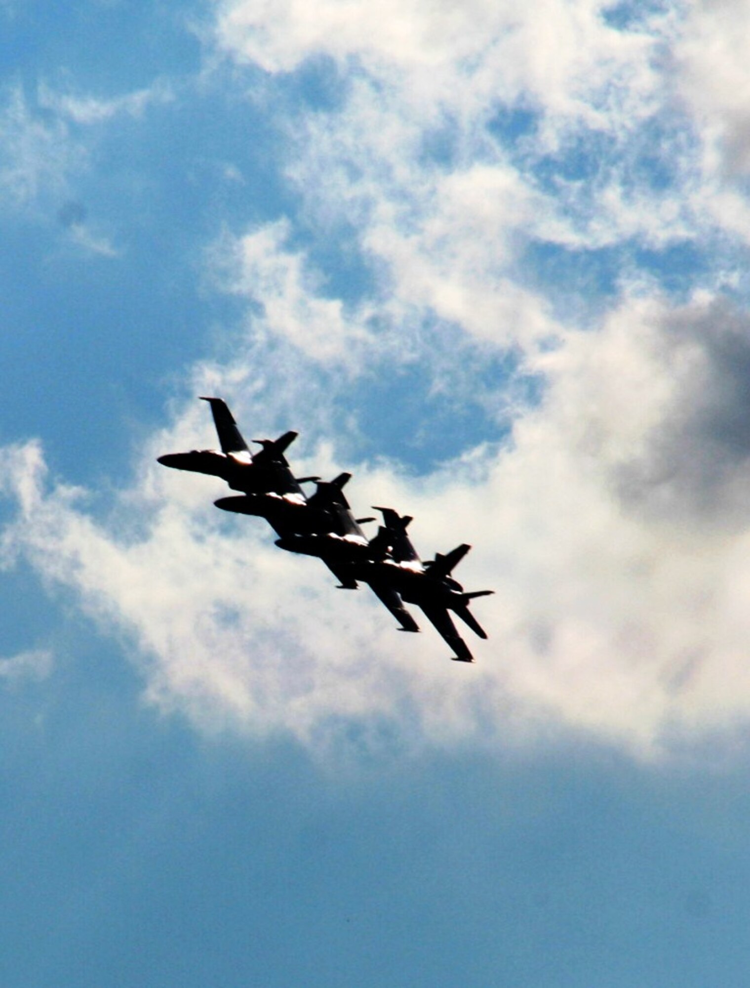 The U.S. Navy's Blue Angels aerial demonstration team performs during the 2010 Airpower Over The Midwest Airshow on Sept. 11, 2010, at Scott Air Force Base, Ill. Tens of thousands of people attended the two-day airshow. (U.S. Air Force Photo/Master Sgt. Scott T. Sturkol)