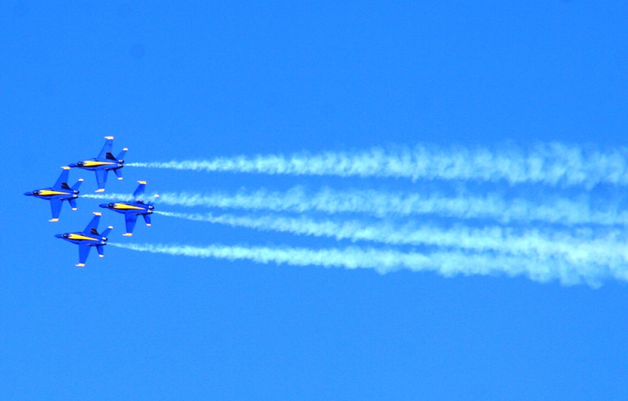 The U.S. Navy's Blue Angels aerial demonstration team performs during the 2010 Airpower Over The Midwest Airshow on Sept. 11, 2010, at Scott Air Force Base, Ill. Tens of thousands of people attended the two-day airshow. (U.S. Air Force Photo/Master Sgt. Scott T. Sturkol)