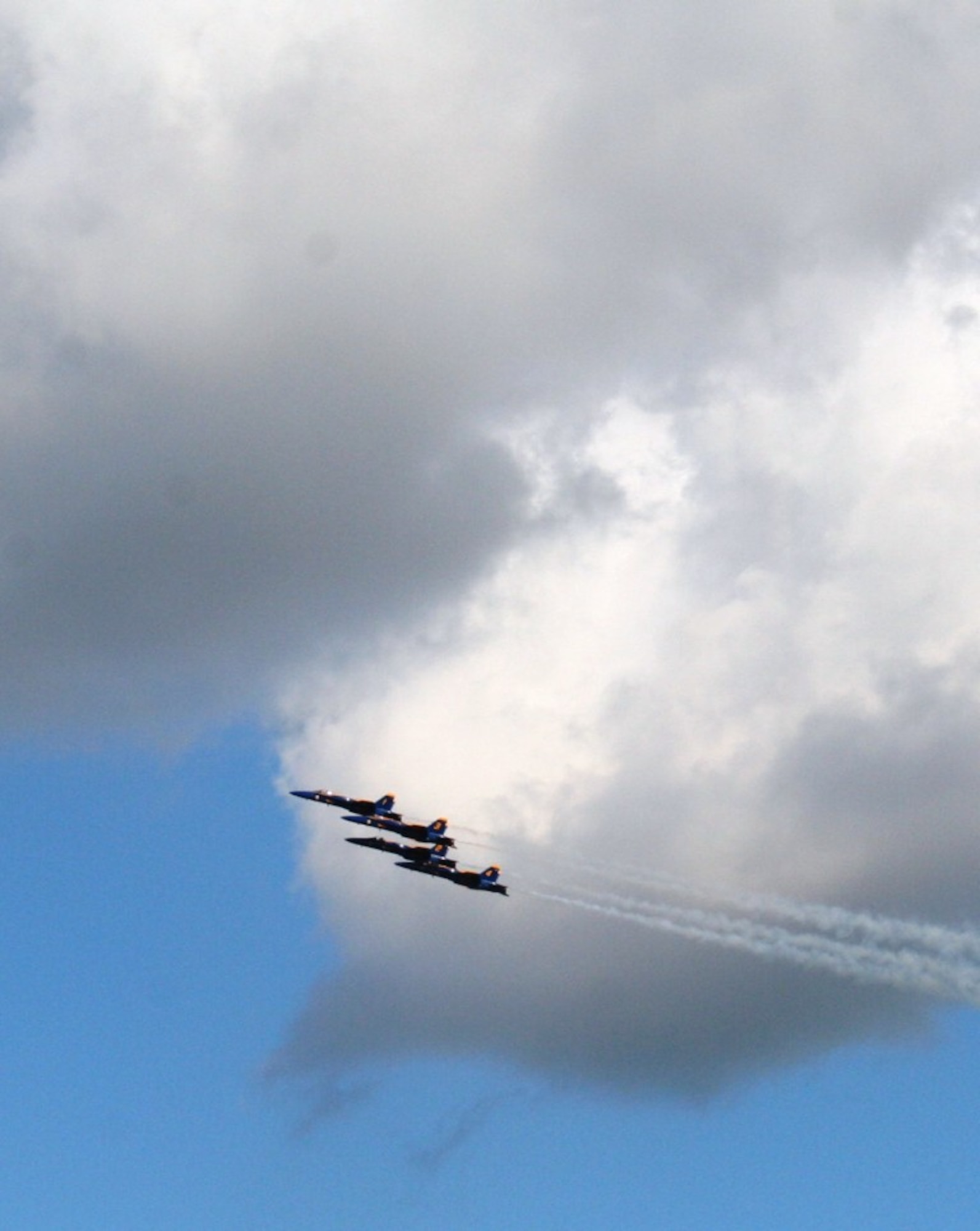 The U.S. Navy's Blue Angels aerial demonstration team performs during the 2010 Airpower Over The Midwest Airshow on Sept. 11, 2010, at Scott Air Force Base, Ill. Tens of thousands of people attended the two-day airshow. (U.S. Air Force Photo/Master Sgt. Scott T. Sturkol)
