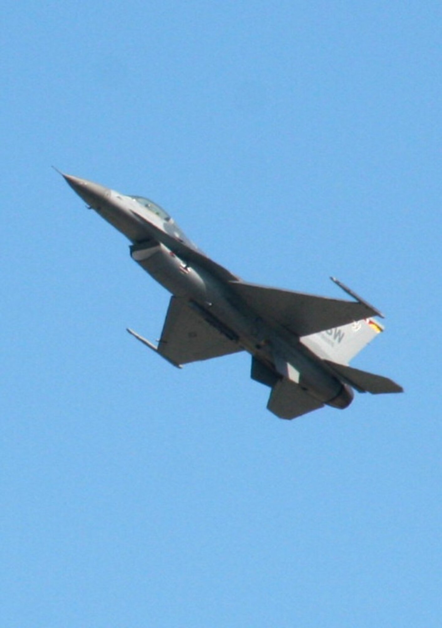 An F-16 Fighting Falcon performs during the 2010 Airpower Over The Midwest Airshow on Sept. 11, 2010, at Scott Air Force Base, Ill. Tens of thousands of people attended the two-day airshow. (U.S. Air Force Photo/Master Sgt. Scott T. Sturkol)