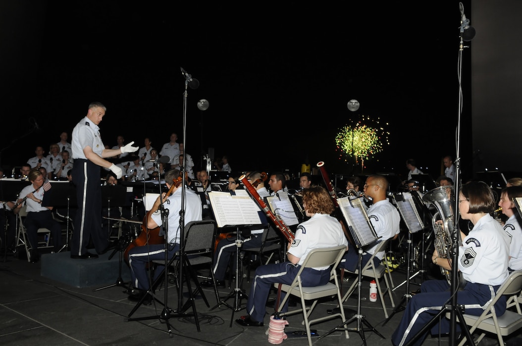 Lt. Col. A. Phillip Waite, United States Air Force Band commander, conducts the Air Force Band’s Concert Band during a public concert July 4. The Band’s six performing ensembles take turns performing throughout the summer at the Air Force Memorial each Wednesday and Friday with no fee for attendance. Lt. Col. A. Phillip Waite assumed command of the Air Force Band in a change-of-command ceremony June 1. (U.S. Air Force photo by Staff Sgt. Raymond Mills)