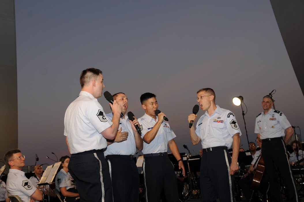 Lt. Col. A. Phillip Waite, United States Air Force Band commander, conducts the Air Force Band’s Concert Band during a public concert July 4. The Band’s six performing ensembles take turns performing throughout the summer at the Air Force Memorial each Wednesday and Friday with no fee for attendance. Lt. Col. A. Phillip Waite assumed command of the Air Force Band in a change-of-command ceremony June 1. (U.S. Air Force photo by Staff Sgt. Raymond Mills)