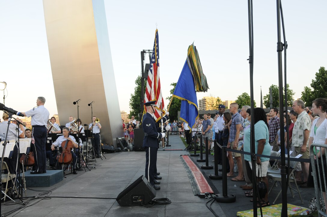 Lt. Col. A. Phillip Waite, United States Air Force Band commander, conducts the Air Force Band’s Concert Band during a public concert July 4. The Band’s six performing ensembles take turns performing throughout the summer at the Air Force Memorial each Wednesday and Friday with no fee for attendance. Lt. Col. A. Phillip Waite assumed command of the Air Force Band in a change-of-command ceremony June 1. (U.S. Air Force photo by Staff Sgt. Raymond Mills)