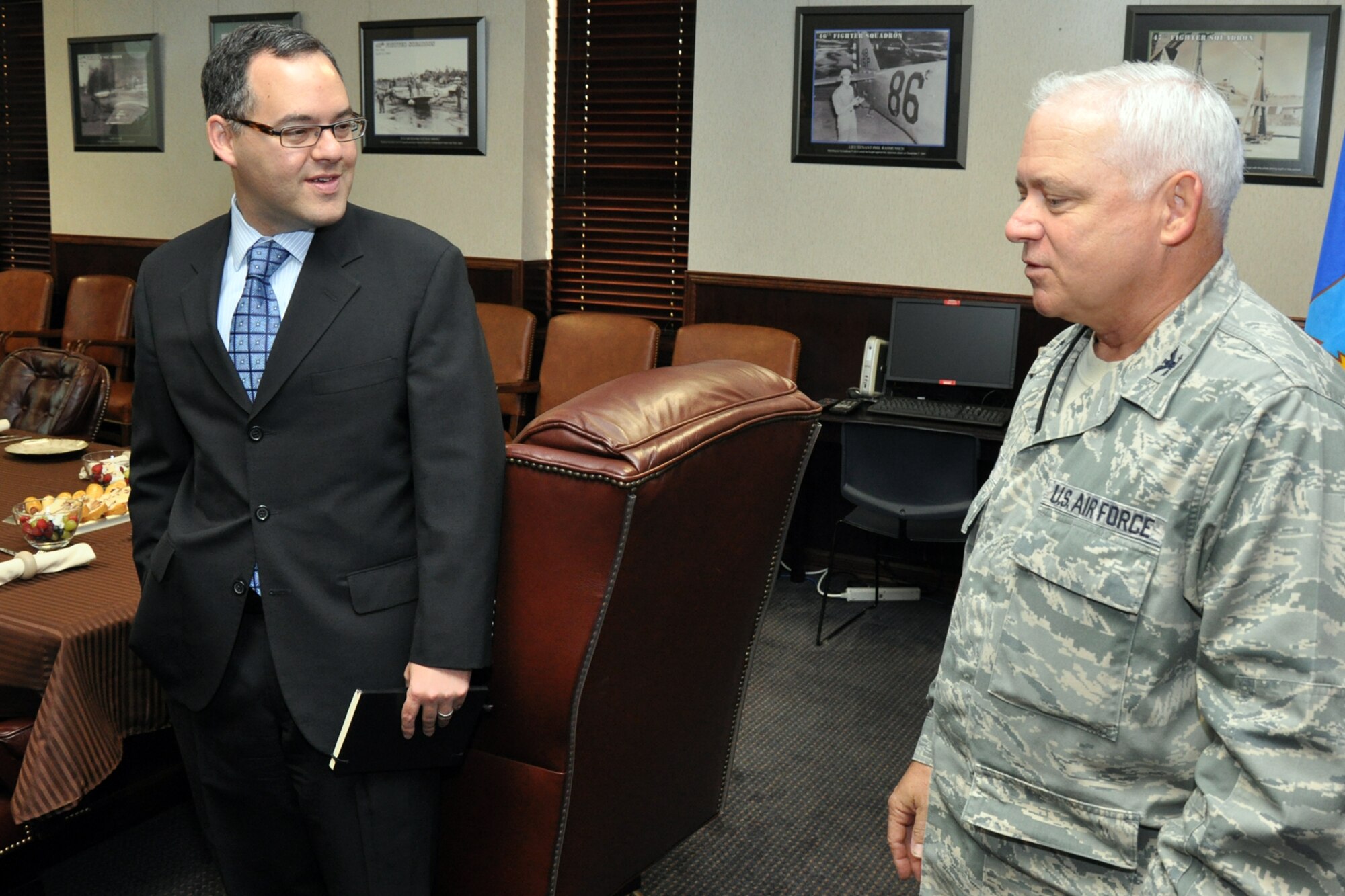 Assistant Secretary of the Air Force for Manpower and Reserve Affairs, the
Honorable Daniel B. Ginsberg, speaks with Col. Kevin Wolfe, 917th Mission
Support Group commander before a breakfast and wing briefing at the 917th
Wing headquarters building during a visit to the wing Sept. 10, 2010. Mr.
Ginsberg was at Barksdale Air Force Base, La., to meet with Air Force Global Strike Command leadership Sept. 9-10, but made a stop at the 917th Wing to meet with senior leaders there about the future transition of the 917th Wing to the 307th Bomb Wing. During his visit, Mr. Ginsberg also visited with instructors and students at STARBASE Louisiana, a 917th Wing sponsored program, which presents an exciting 25-hour hands on/minds on aviation and aerospace curriculum to area 5th graders. (U.S. Air Force photo/Tech. Sgt. Jeff Walston)  
