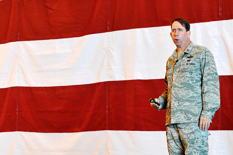 OFFUTT AIR FORCE BASE, Neb. - 55th Wing Commander Brigadier Gen. John N.T. Shanahan talks to Team Offutt members during the 55th Wing commander's call Sept. 9 inside the Bennie Davis Maintenance Facility in perperation for the upcoming unit compliance inspection.  U.S. Air Force photo by Charles Haymond
