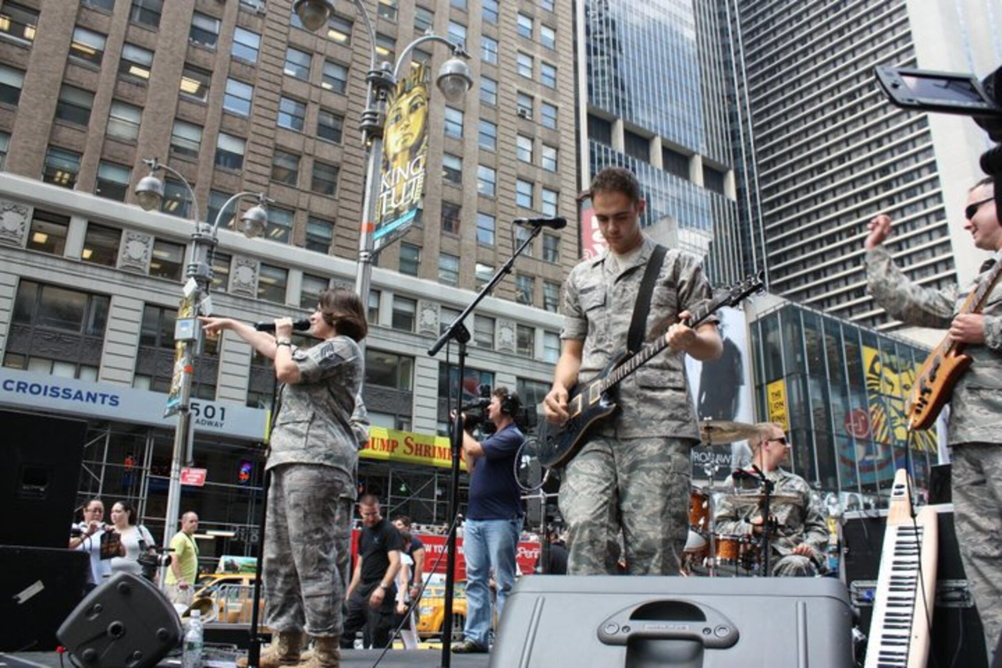 "The United States Air Force Band of Liberty's Afterburner had the unique
opportunity to perform for thousands of passersby as part of Air Force Week
New York (August 24-29) .  Various Air Force exhibits were spread over two
blocks of Times Square to help educate citizens and visitors of New York
about Airmen and the Air Force mission. Among the displays available
included the Thunderbird F-16, Monster Truck displays, the Orange County Air
Force chopper, and 3 performances by the Air Force Band of Liberty's
Afterburner."