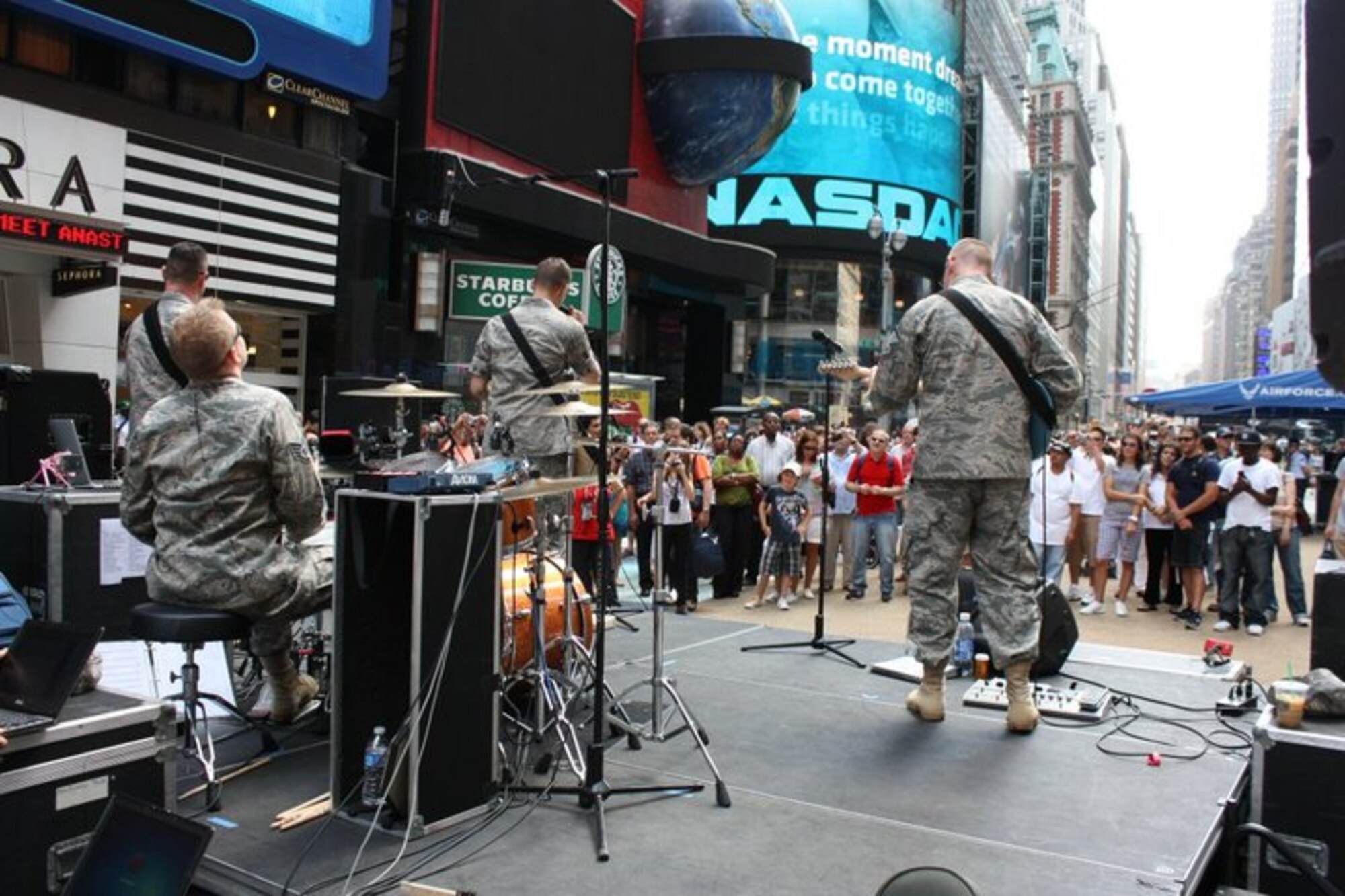 "The United States Air Force Band of Liberty's Afterburner had the unique
opportunity to perform for thousands of passersby as part of Air Force Week
New York (August 24-29) .  Various Air Force exhibits were spread over two
blocks of Times Square to help educate citizens and visitors of New York
about Airmen and the Air Force mission. Among the displays available
included the Thunderbird F-16, Monster Truck displays, the Orange County Air
Force chopper, and 3 performances by the Air Force Band of Liberty's
Afterburner."