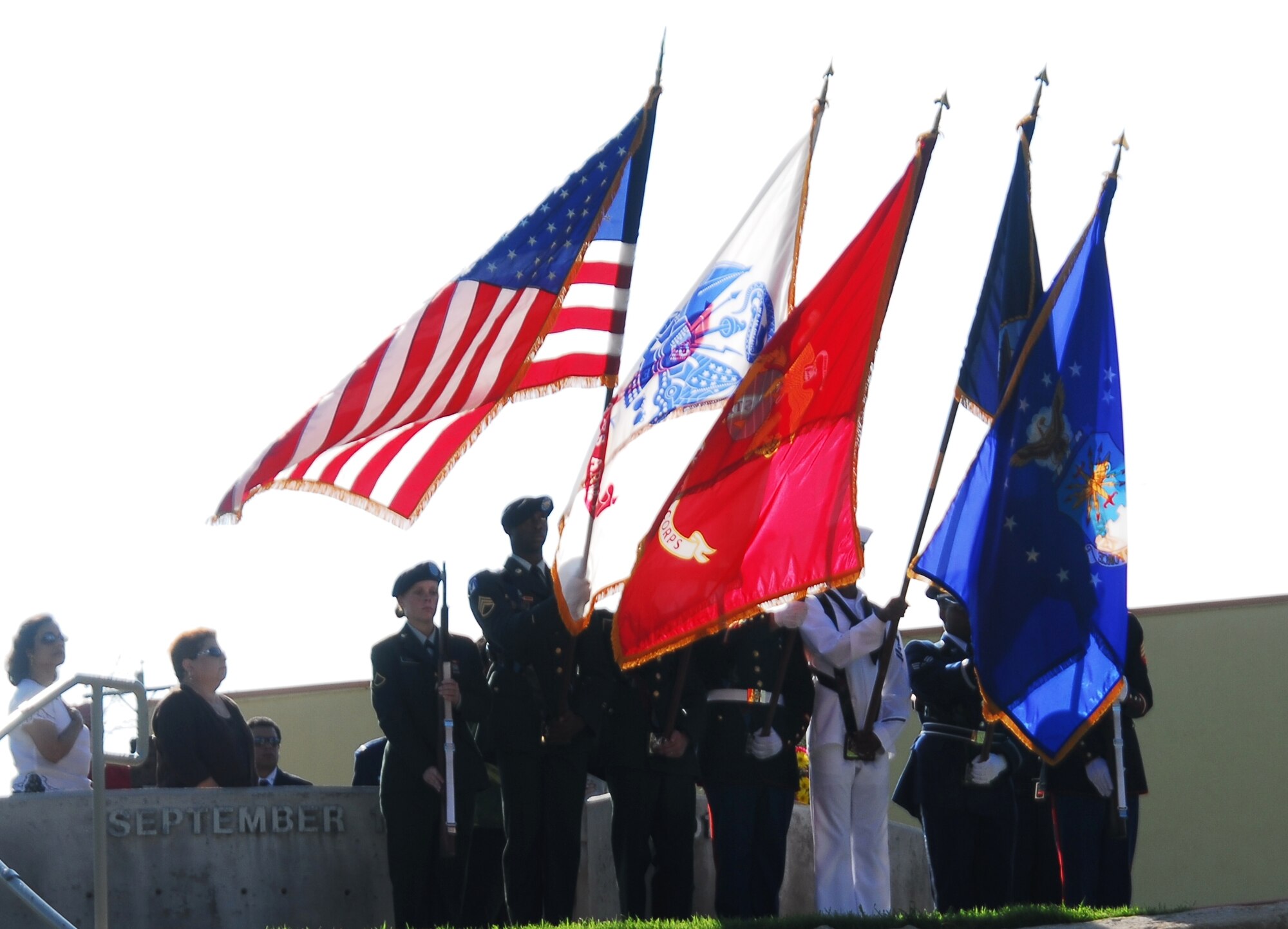 Goodfellow's Joint Service Color Guard presents the Colors at a 9/11 Memorial Service at the 9/11 Memorial Monument near the San Angelo Museum of Fine Arts Sept. 11. The event also honored a resident, Judy Rowlett, who died during the Sept. 11, 2001, attack at the Pentagon. (U.S. Air Force photo/Kent Cummins)