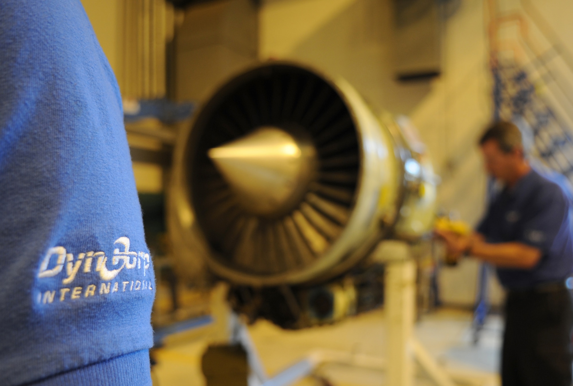Perry Palhamus, DynCorp International C-21A aircraft mechanic, dismantles a turbine engine shroud during an engine swap, Ramstein Air Base, Germany, Sept. 13, 2010. DynCorp International helps play a major role in the success of the Ramstein mission by providing maintenance-essential functions of their C-21 for continued distinguished visitor support, aeromedical evacuation missions and U.S. African Command missions 24 hours a day, year round at six worldwide main operating bases and one overseas-extended deployment base. (U.S. Air Force photo by Senior Airman Caleb Pierce)