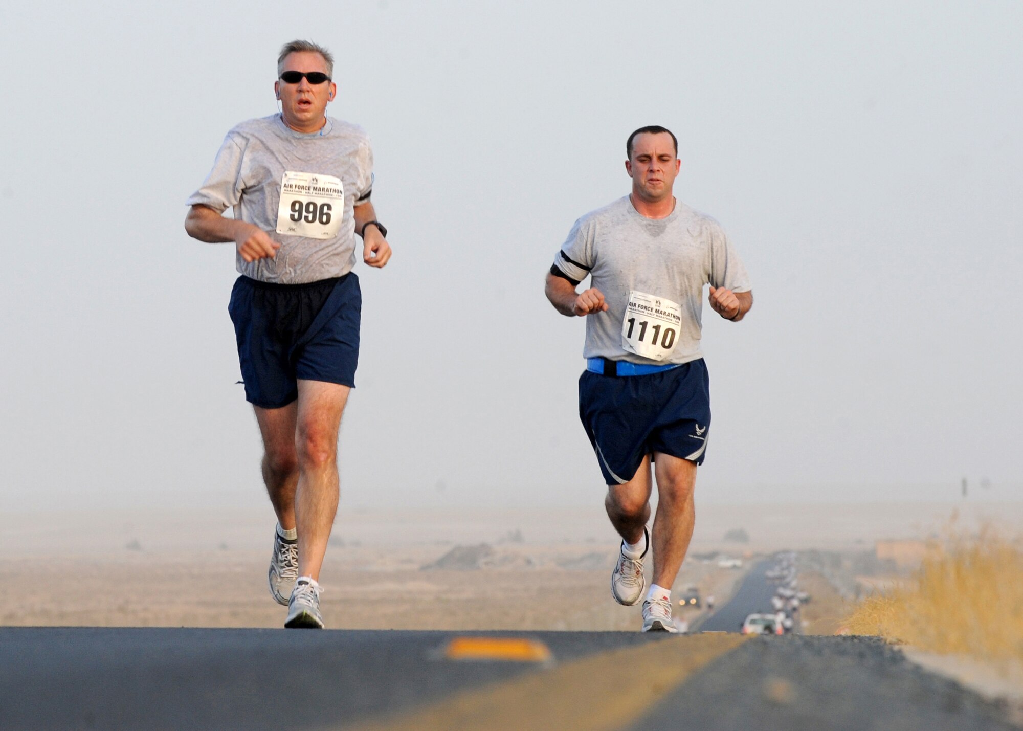 SOUTHWEST ASIA - Airmen from the 386th Air Expeditionary Wing lead the way during the Air Force Half Marathon at an undisclosed air base here Sept. 10, 2010. The 386th Expeditionary Force Support Squadron hosted the event to support the Annual Air Force Marathon, which will take place Sept. 18 at Wright-Patterson Air Force Base, Ohio. The half marathon is a challenging 13.1-mile run. (U.S. Air Force photo by Senior Airman Laura Turner)