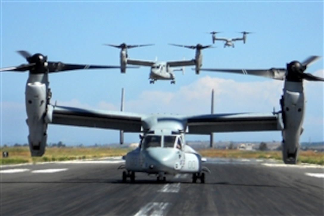 A line of MV-22 Osprey aircraft from Marine Medium Tilt-Rotor Squadron 266 arrives at Naval Air Station Sigonella, Italy, Sept. 10, 2010. The squadron is deployed aboard the USS Kearsarge, which is en route to provide relief to flood-stricken regions of Pakistan.