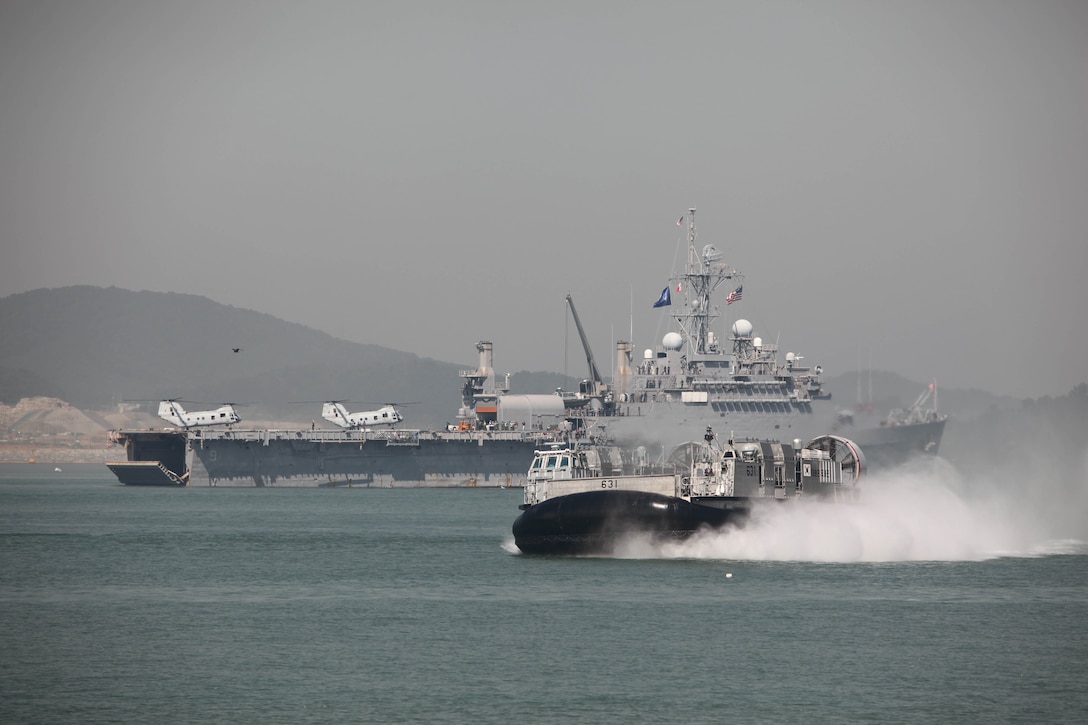 A Republic of Korea Landing Craft, Air Cushioned passes near the USS Denver (LPD 9) during a reenactment of the Incheon Landing Sept 15. Marines and Sailors from the 31st Marine Expeditionary Unit embarked aboard the Denver participated in the event honoring veterans of the war.