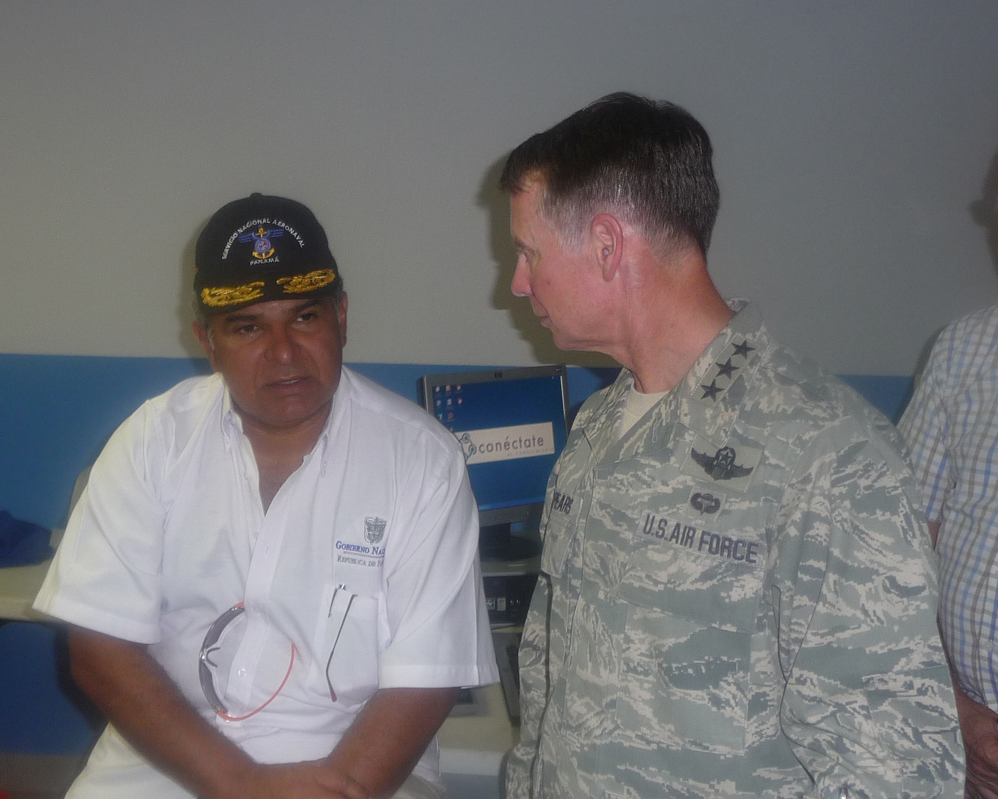 METETI, Panama -- Lt. Gen. Glenn Spears, 12th Air Force (Air Forces Southern) commander (right), speaks with Mr. Raul Molino, Panama's Minister of Public Security, during the New Horizons Panama 2010 closing ceremonies. (U.S. Air Force photo)