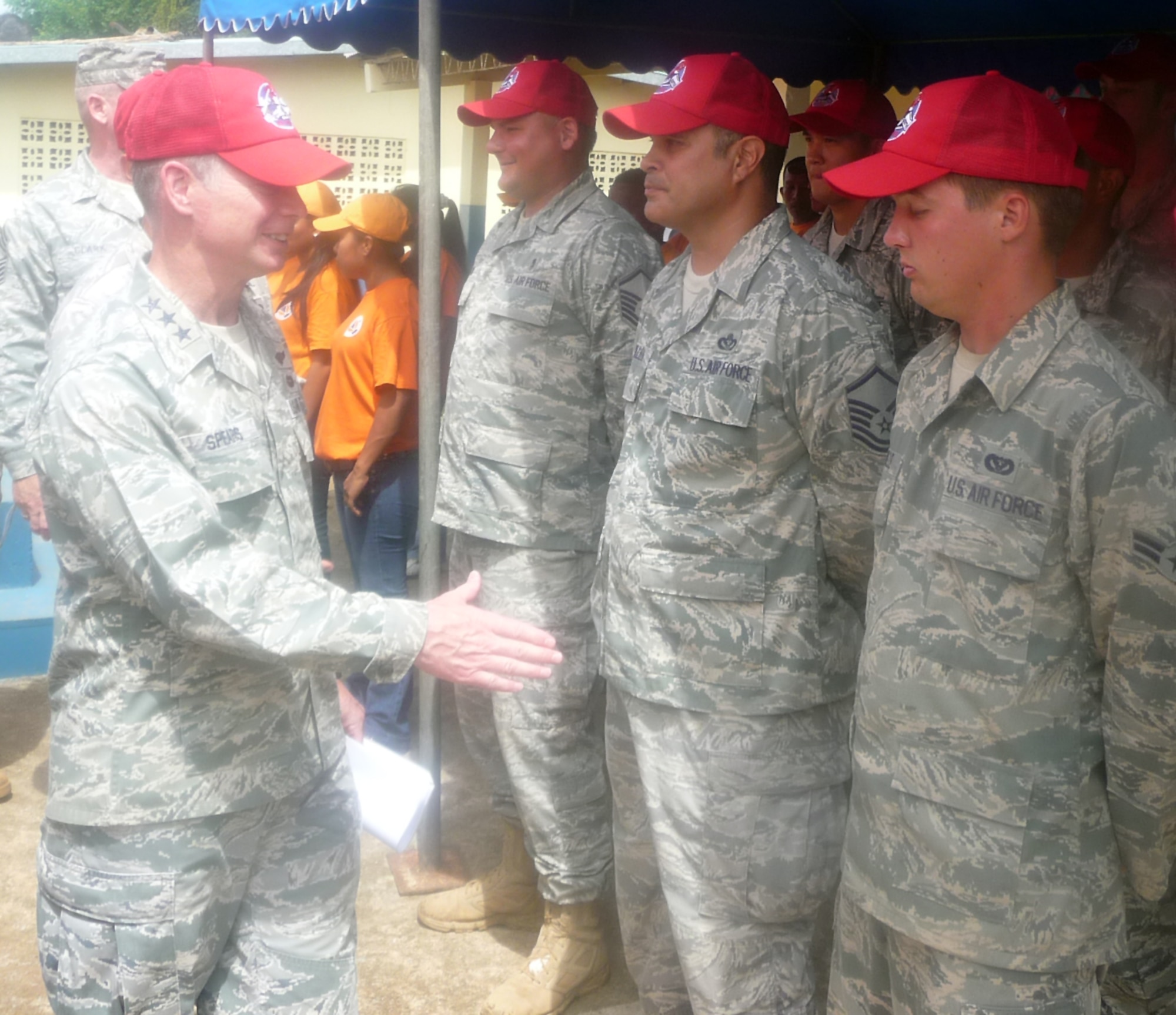 METETI, Panama -- Lt. Gen. Glenn Spears, 12th Air Force (Air Forces Southern) commander, shakes hands with Airmen from the 820th Expeditionary RED HORSE Squadron during the New Horizons Panama 2010 closing ceremonies. (U.S. Air Force photo)