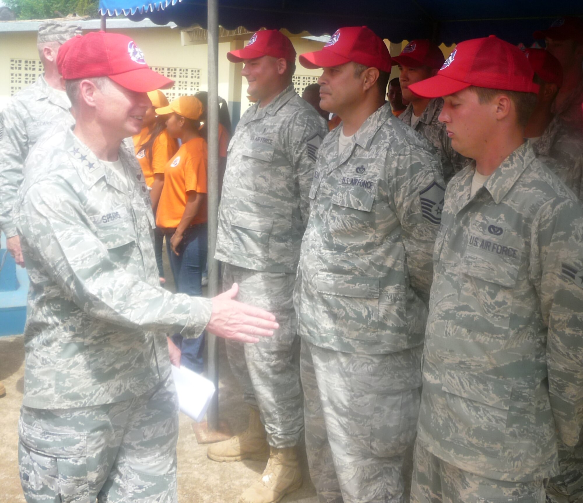 METETI, Panama -- Lt. Gen. Glenn Spears, 12th Air Force (Air Forces Southern) commander, shakes hands with Airmen from the 820th Expeditionary RED HORSE Squadron during the New Horizons Panama 2010 closing ceremonies. (U.S. Air Force photo)