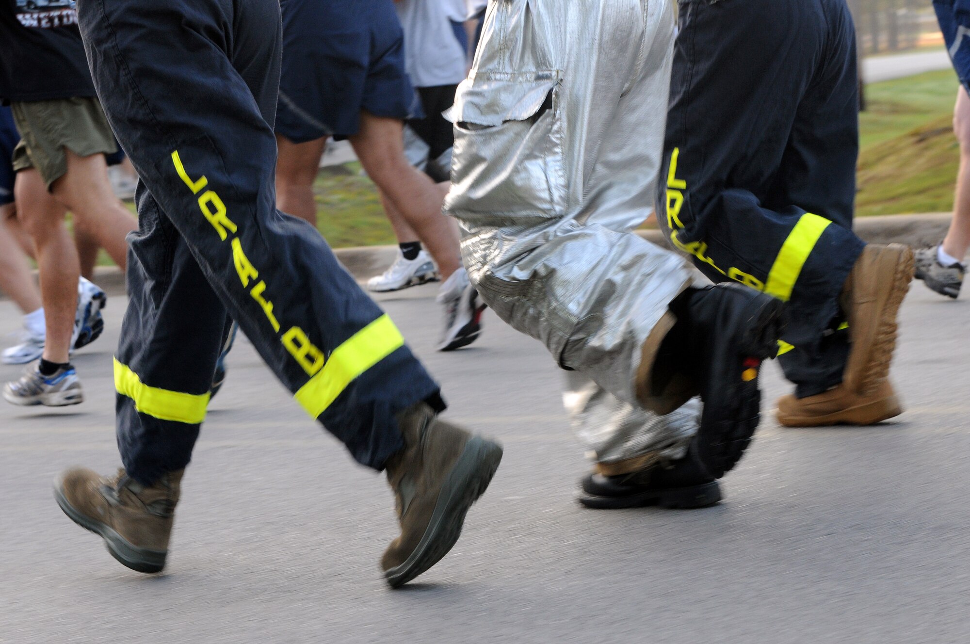 Firefighters from the 19th Civil Engineer Squadron run in the Sept. 11 Remembrance 5K run Sept. 10 here. Airmen from across the base ran in the event to honor the firefighters, police and military members who responded to the Sept. 11, 2001, attacks. (U.S. Air Force photo by Staff Sgt. Chris Willis)