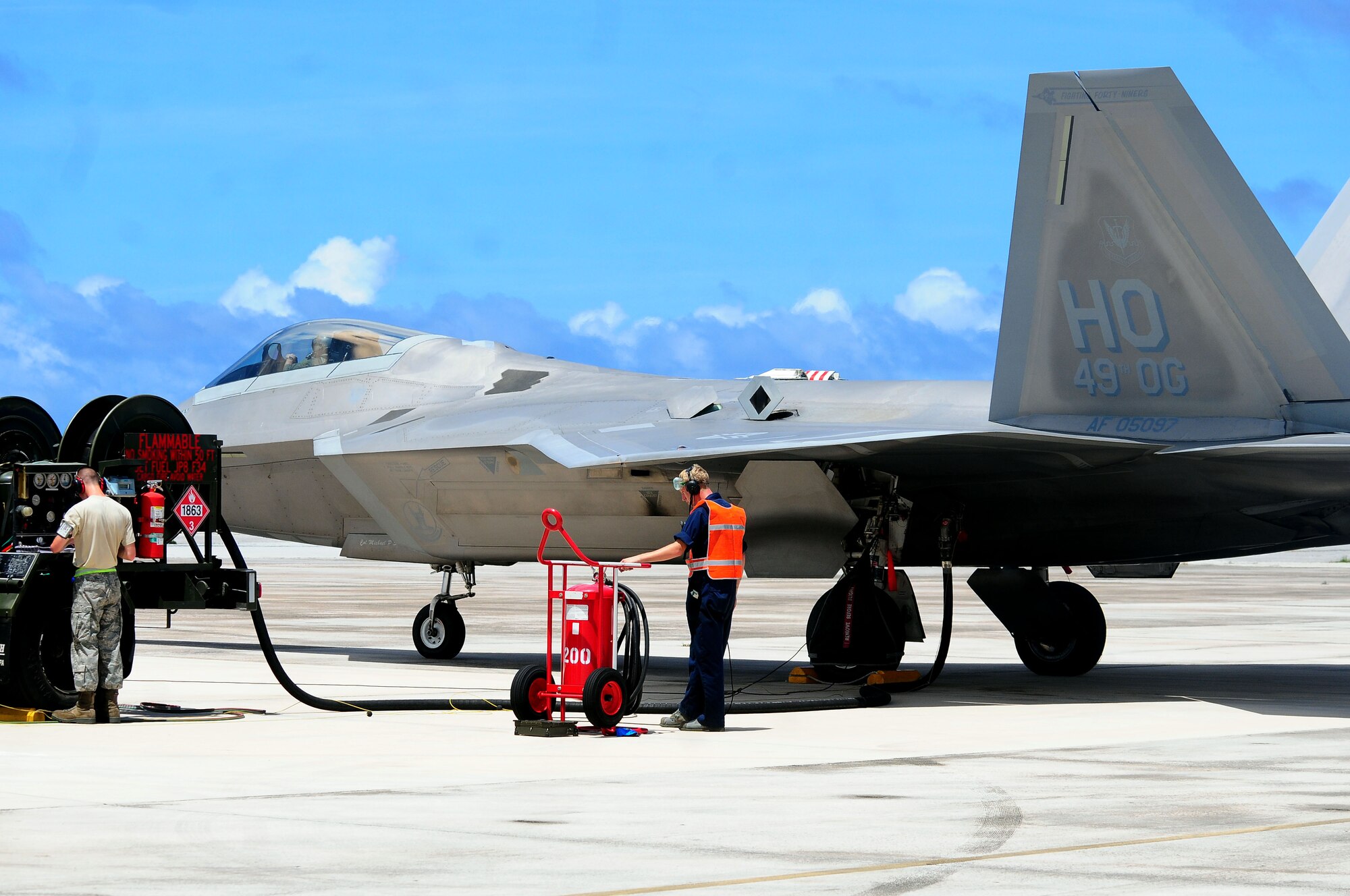 An F-22 Raptor is refueled while participating in Valiant Shield at Andersen Air Force Base, Guam, on Sept. 14, 2010.  Valiant Shield is an integrated joint training exercise that allows different units and teams from across the military the opportunity to work together. (U.S. Air Force photo by Airman Julian North)