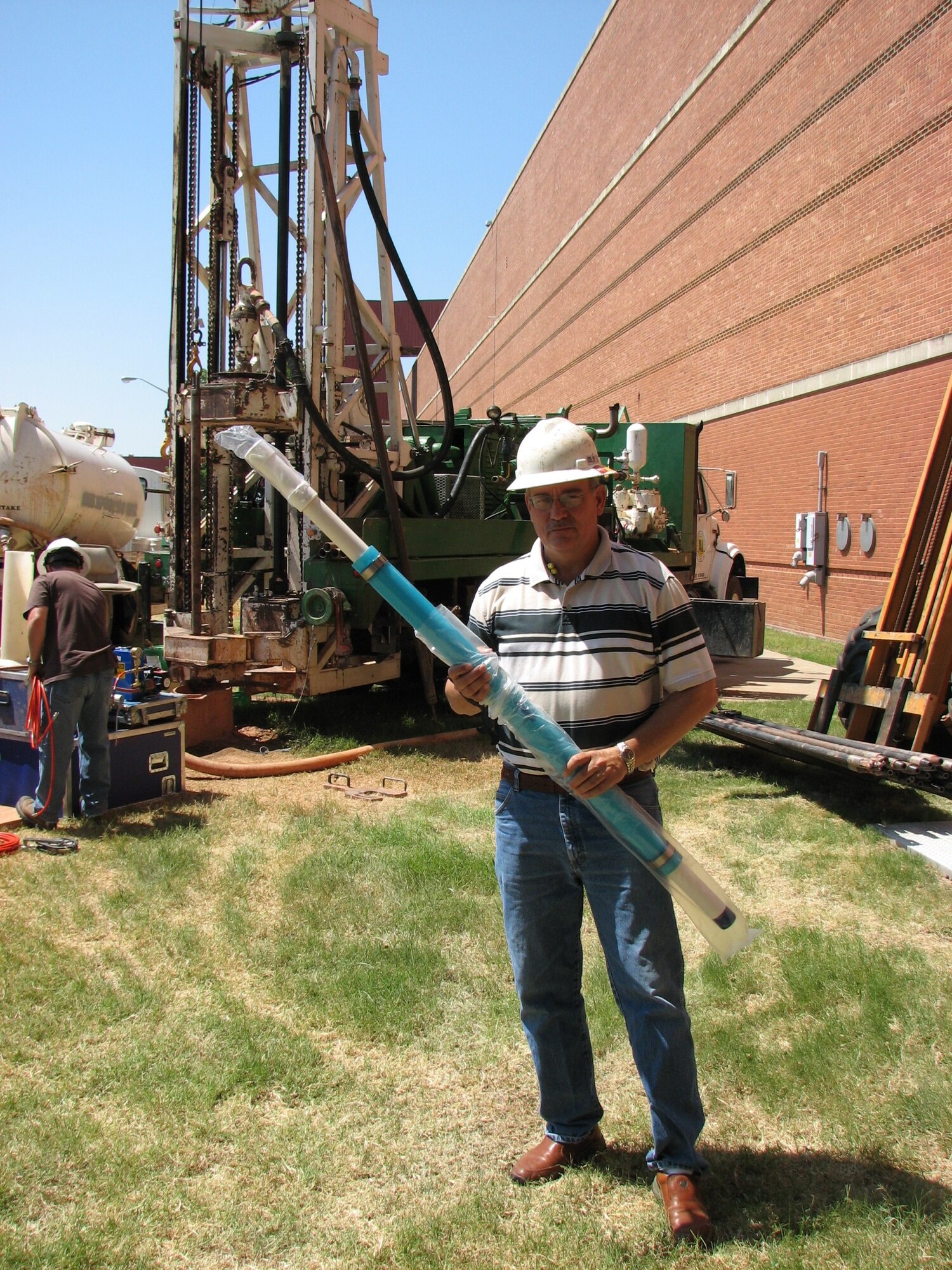 Vinton King, 72nd Air Base Wing Civil Engineer Directorate holds a monitoring device that will be placed in a well outside Tinker’s Bldg. 3001. The wells are drilled to install the devices, which monitor and track chemicals at varying depths in the “upper-saturated zone” ground water. After a recent visit, officials say Tinker is on target in environmental cleanup efforts that are part of the installation restoration program. (Air Force photo by Brion Ockenfels)   