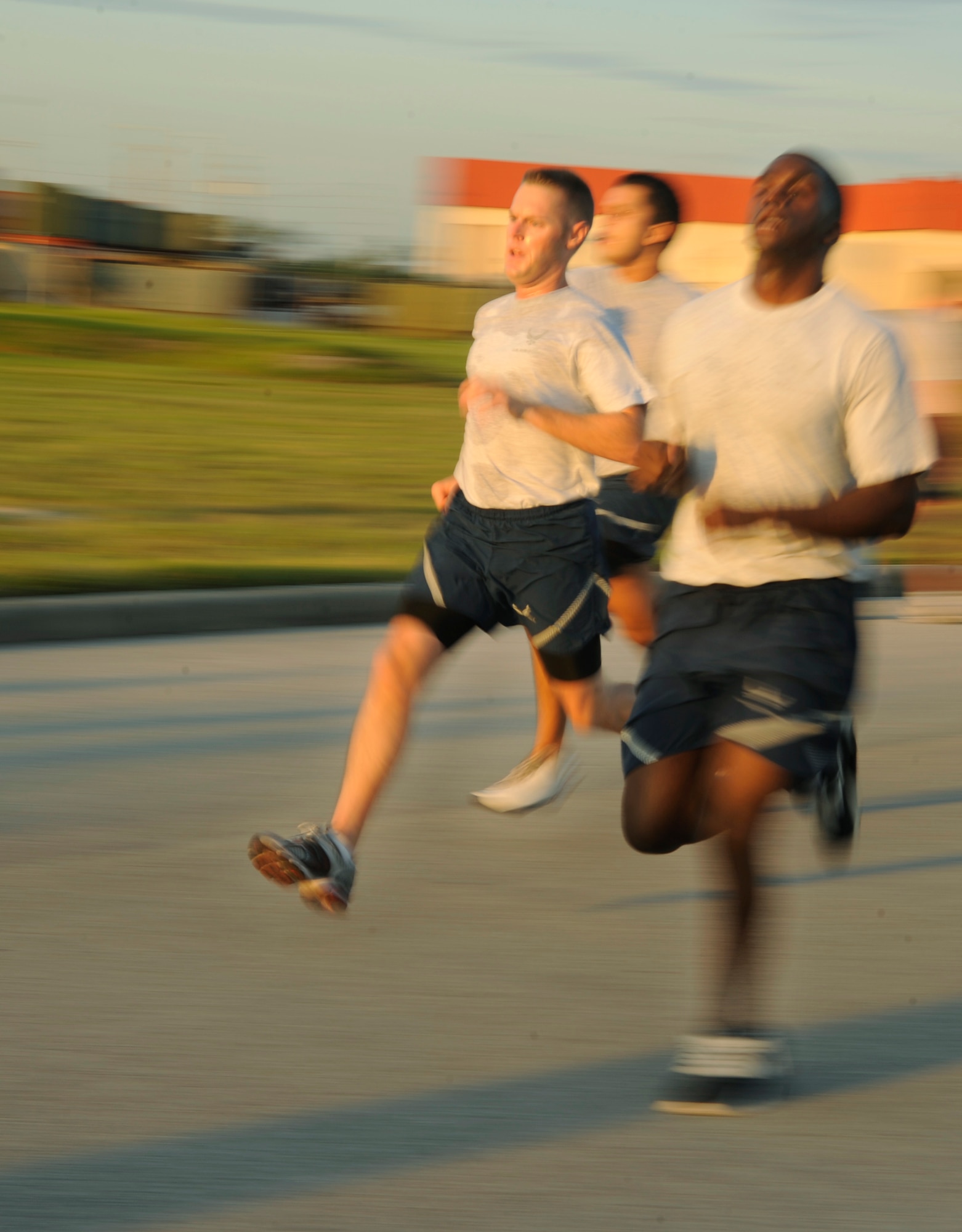 2nd Lt. Mark Graff , 6th Air Mobility Wing Public Affairs officer, speeds past fellow airman during the Air Force Birthday 5K Run at MacDill Air Force Base, Fla., Sept. 15, 2010. 
(U.S. Air Force photo by Senior Airman Linzi Joseph/Released)
