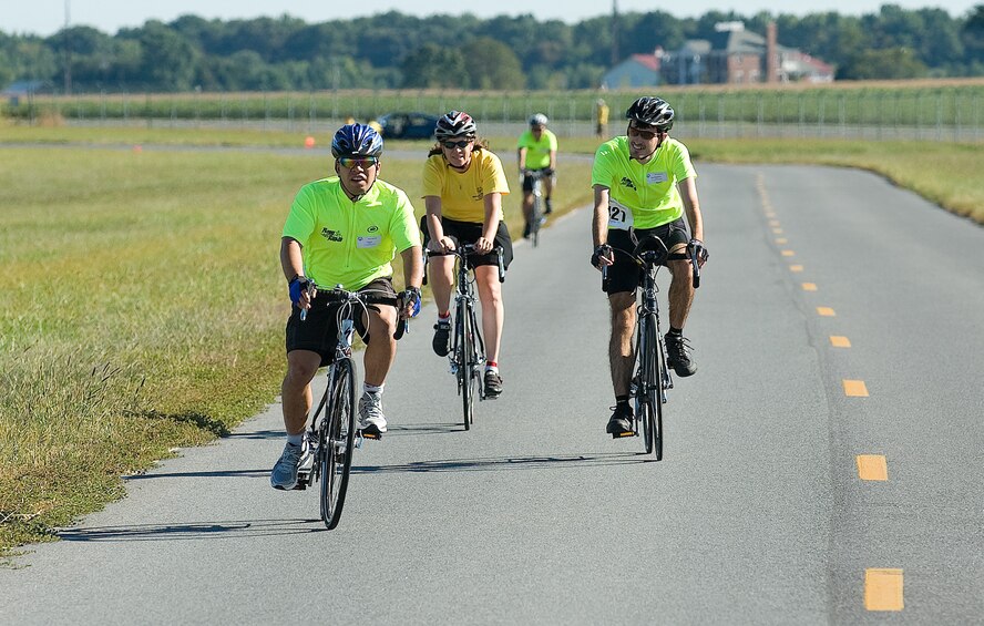Competitors race toward the finish line during the Special Olympics of Delaware cycling competiton Sept. 11, 2010. The races were held from 8 to 11 a.m. and were at distances of 500 meters, one kilometer, five kilometers, 10 kilometers, 15 kilometers, 20 kilometers and a tandem bike event. (U.S. Air Force photo by Jason Minto/Released)