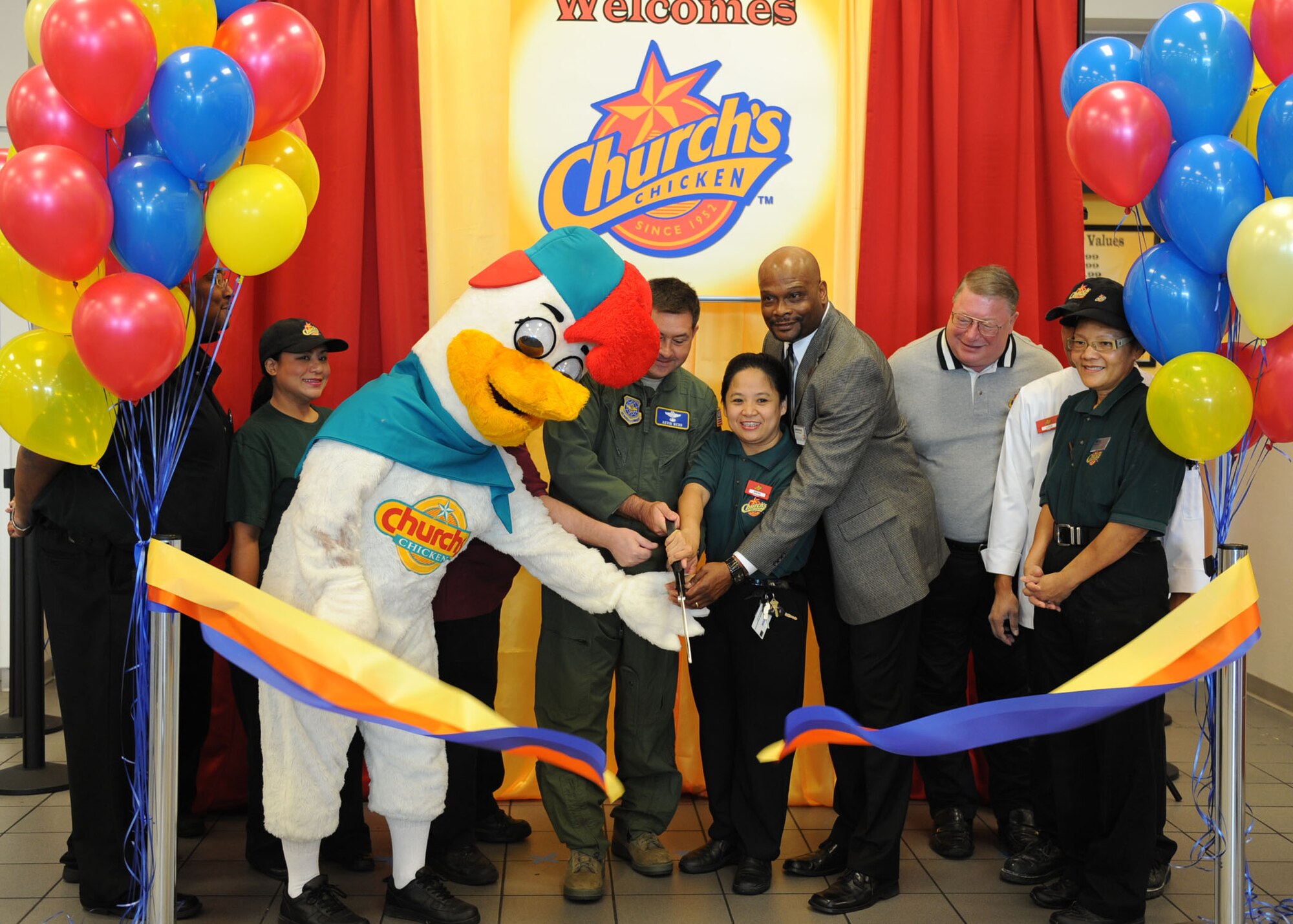 Church’s Chicken employees, BX General Manager Lawrence E. Simmons, Jr. and Col. Kevin Webb, 375th Air Mobility Wing vice commander, cut the ribbon Sept. 7 to open the newest food option at the Base Exchange.

