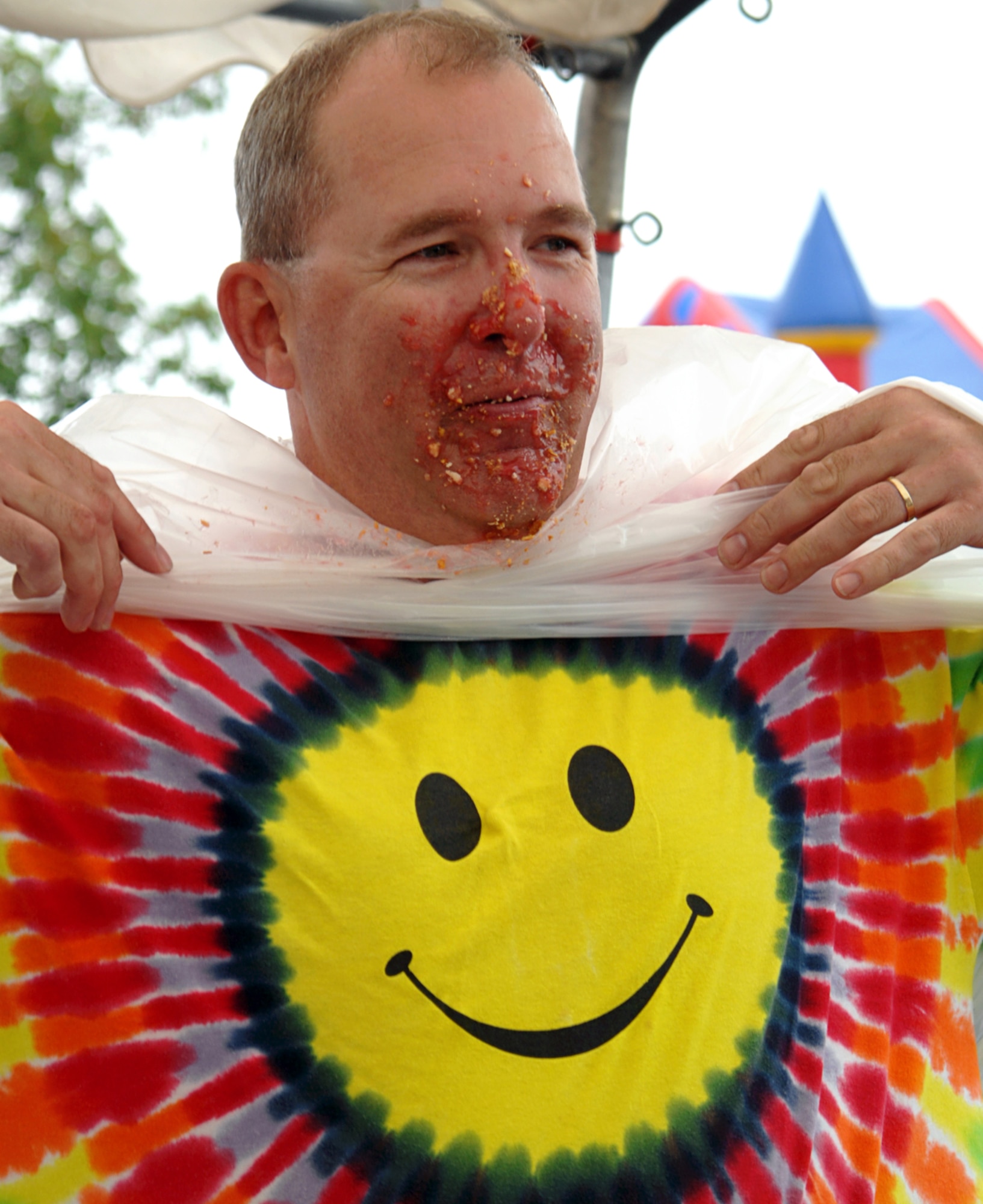 GRISSOM AIR RESERVE BASE, Ind., -- Master Sgt. Chris "Gumby" Rust, 434th Civil Engineers Squadron, celebrates winning the pie eating contest.  Gumby devoured his cherry pie the fastest to win first place in the contest. (U.S. Air Force photo/Tech. Sgt. Douglas Hays)