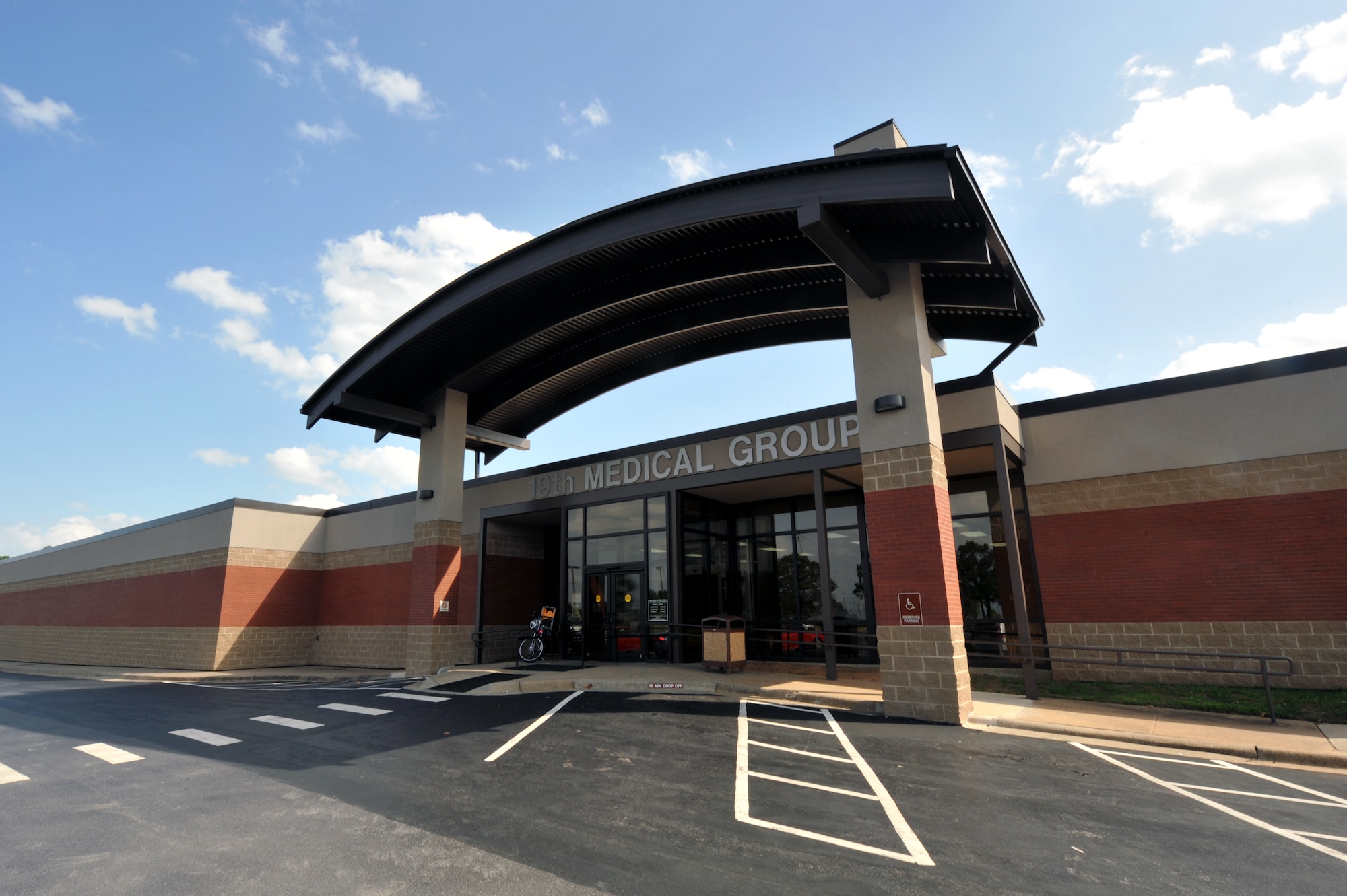 View of the front entrance of the Medical Group building. The Medical Group has completed nine separate remodeling phases totaling more than $27 million since the last Health Services Inspection and Accreditation Association for Ambulatory Healthcare Correct Inspection in 2007. The next HSI and AAAHC inspection begins Sept. 20 – 24.  (U.S. Air Force photo by Staff Sgt. Chris Willis)