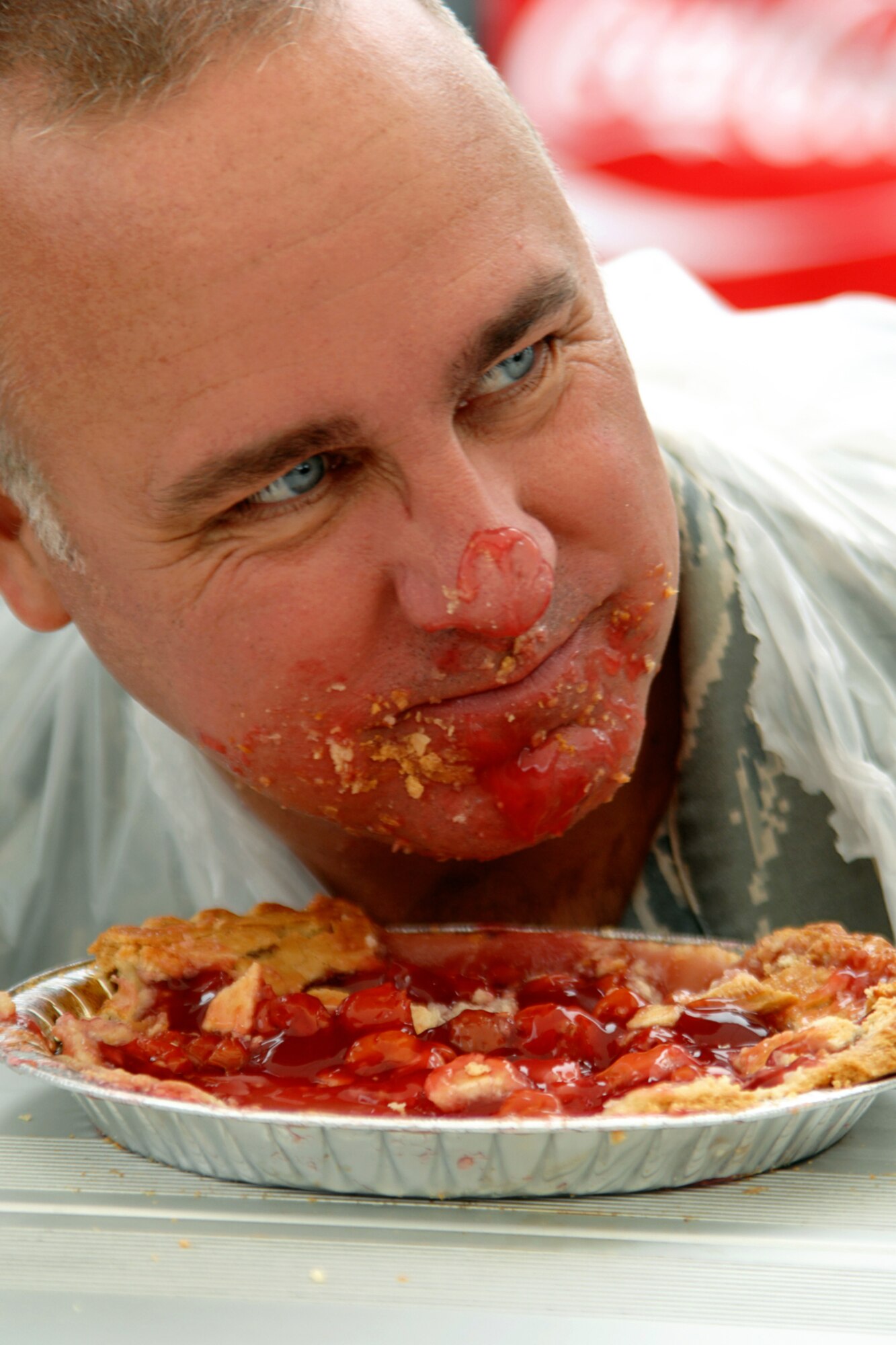 GRISSOM AIR RESERVE BASE, Ind., -- With cherry pie glaze covering his chin, Chief Master Sgt. Larry Brady, 434th Air Refueling Wing command chief, gazes at the competition during the pie eating contest held during the family day picnic. (U.S. Air Force photo/Tech. Sgt. Douglas Hays)