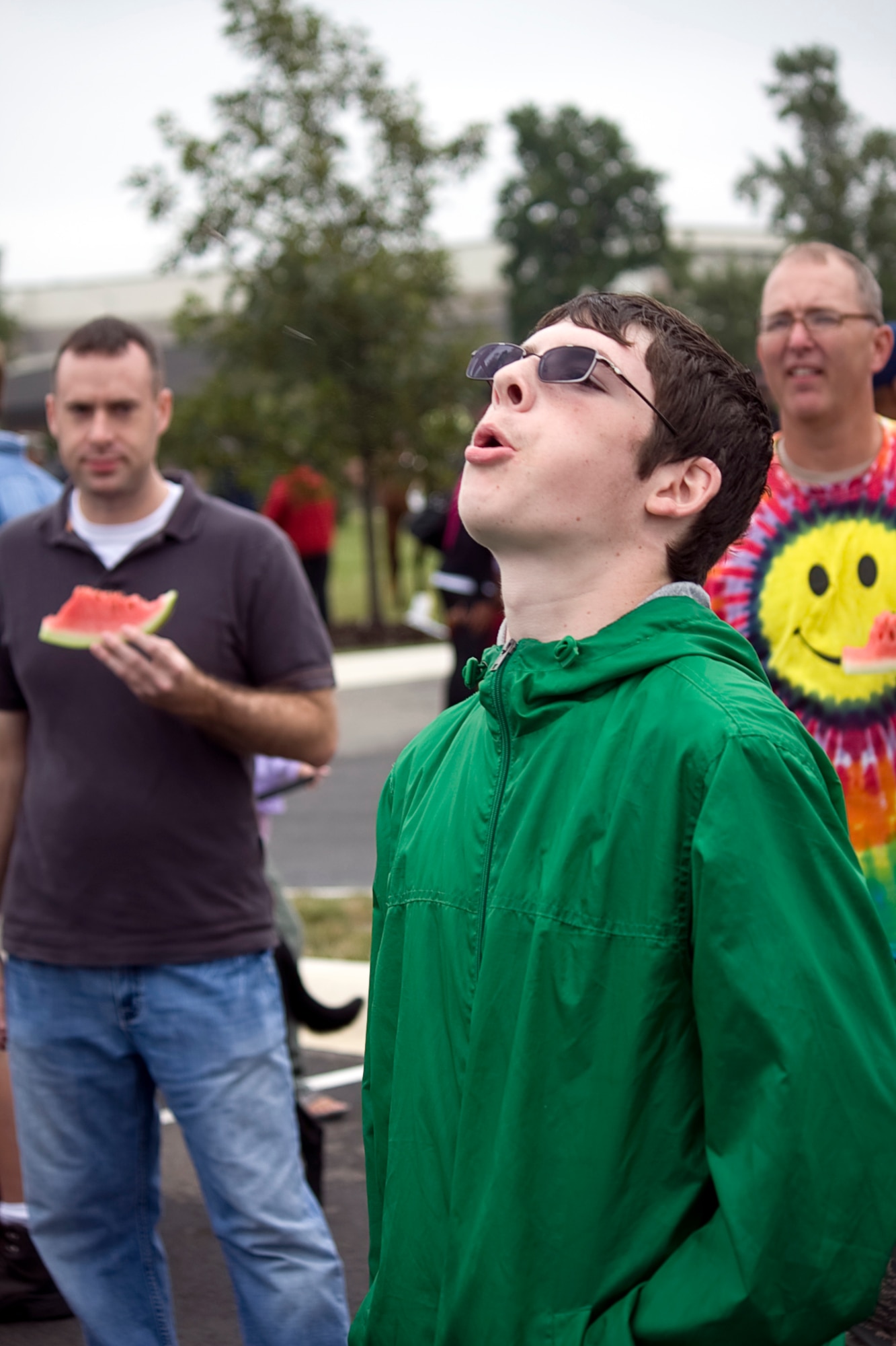 GRISSOM AIR RESERVE BASE, Ind. -- Justin Stepp, 16, son of Tech. Sgt. Cynthia Stepp, blasts a watermelon seed over 250 inches to take home the top prize during a watermelon-seed-spitting contest Sept. 11. The contest was held during the Grissom Family Day picnic, which featured several competitive and non-competitive activities for base personnel and their families. (U.S. Air Force photo/Tech. Sgt. Mark R. W. Orders-Woempner)